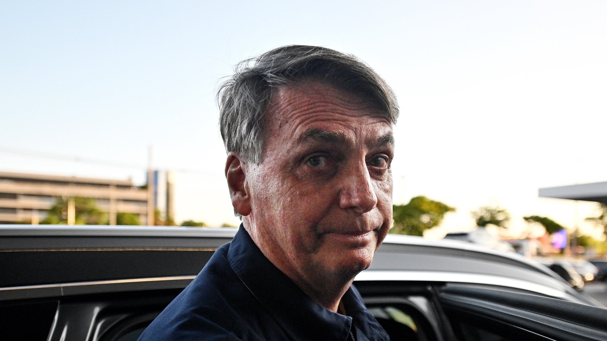 epa10870753 Former president of Brazil Jair Bolsonaro (2019-2022) speaks upon his arrival at the Presidente Juscelino Kubitschek International Airport after receiving a medical discharge after undergoing two surgeries in Sao Paulo, in Brasilia, Brazil, 19 September 2023.  EPA/Andre Borges