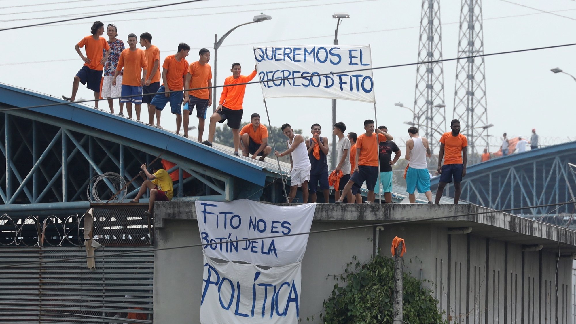 epa10800548 A group of prisoners protest at the Regional Prison of Guayaquil, in Guayaquil, Ecuador, 14 August 2023. Inmates of the Penitenciaria del Litoral and the Regional Prison of Guayaquil protested to demand the return of Aldolfo Macias &#039;Fito&#039; to his original cell, identified by authorities as the leader of the criminal gang &#039;Los Choneros&#039;, who on 13 August was taken from the Regional Prison to the maximum security prison, called La Roca.  EPA/Jonathan Miranda