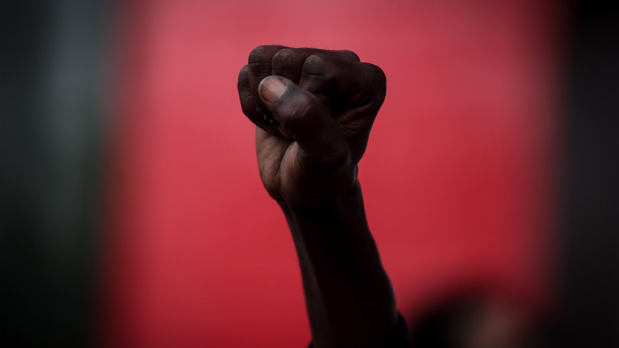 epa08832238 View of a fist during a protest against racism after the murder of Joao Silveira, in front of the Sao Paulo Museum of Art (MASP), in Sao Paulo, Brazil, 20 November 2020. Protests held in several Brazilian cities on Friday denounced the murder of a black man by two security guards in a supermarket, an episode compared to that of the American George Floyd. The welder Joao Alberto Silveira Freitas, 40, died on Thursday night after receiving a beating from two guards at a Carrefour supermarket located in the southern city of Porto Alegre, on the eve of Black Awareness Day, celebrated on 20 November and that marks the fight for the rights of black people in Brazil.  EPA/Fernando Bizerra  EPA-EFE/Fernando Bizerra