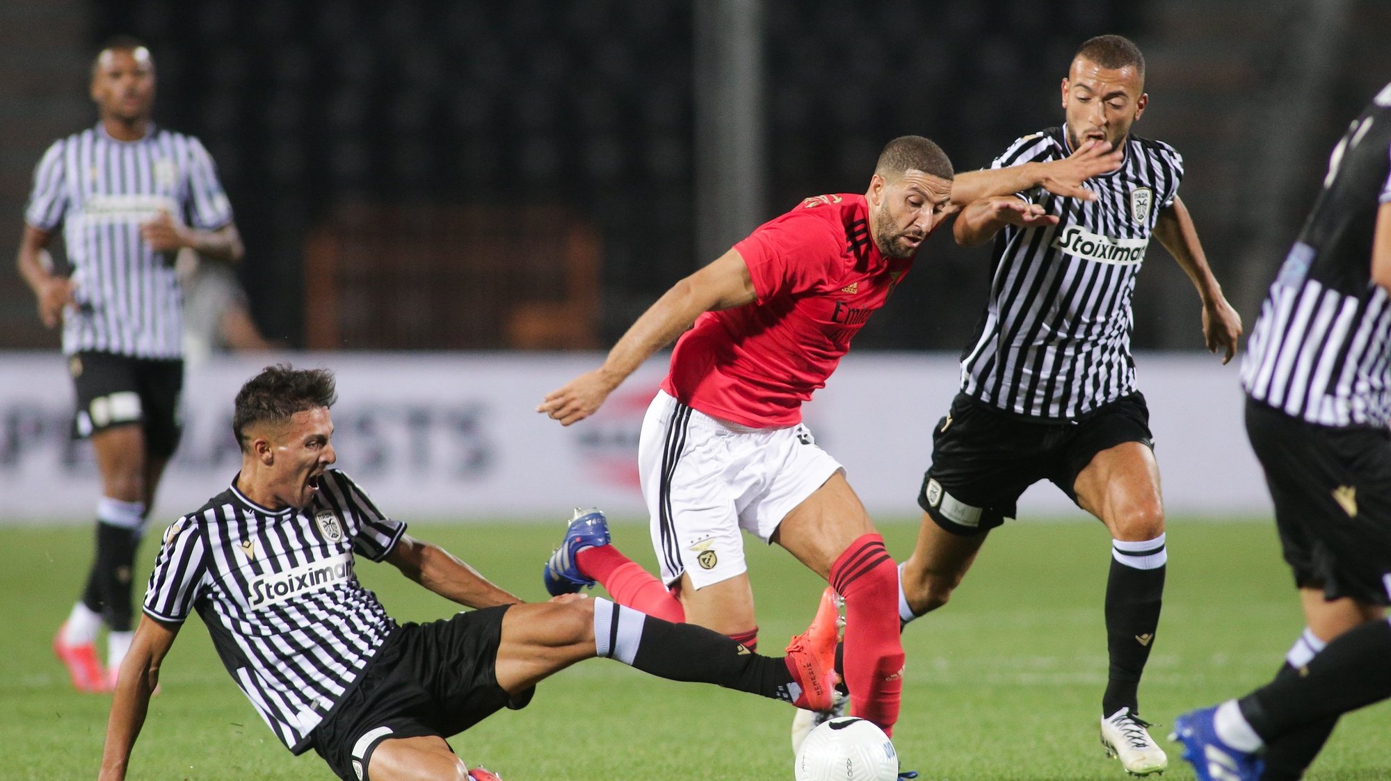 epa08671661 Benficas Adel Taarabt (R) in action against Paoks Dimitris Giannoulis (L) during the UEFA Champions League 3nd qualifying round match between PAOK FC and Benfica in Thessaloniki, Greece, 15 August 2020.  EPA/Achilleas Chiras