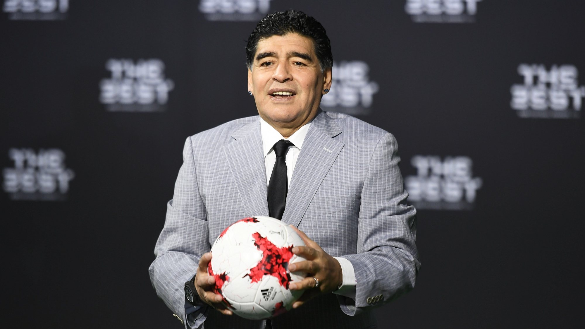 epa08841528 (FILE) - Argentinian soccer legend Diego Armando Maradona poses for photographers as he arrives prior to the FIFA Awards 2016 gala at the Swiss TV studio in Zurich, Switzerland, 09 January 2017 (re-issued on 25 November 2020). Diego Maradona has died after a heart attack, media reports claimed on 25 November 2020.  EPA/WALTER BIERI *** Local Caption *** 53218238