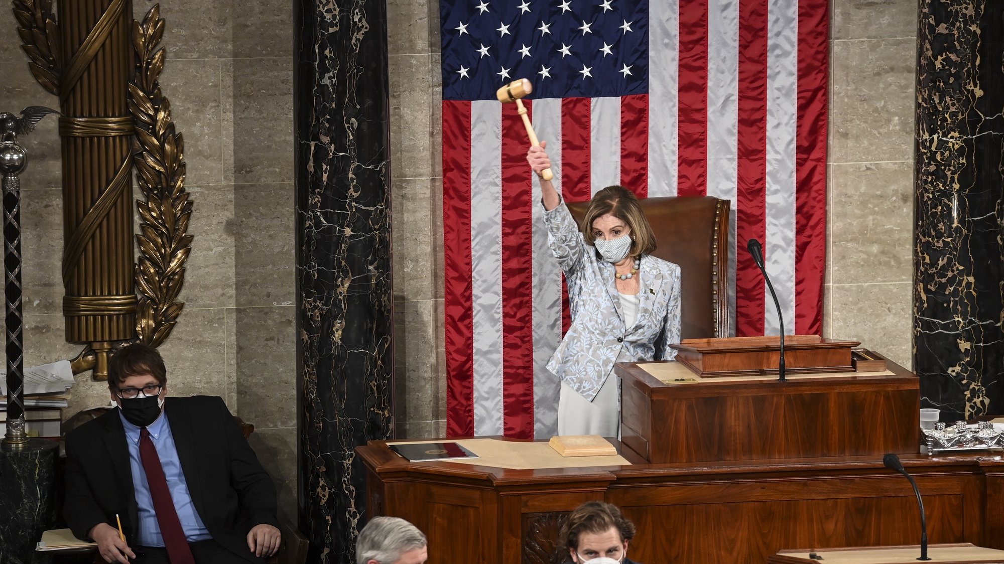 epa08917852 House Speaker Nancy Pelosi (D-Calif.) waves the gavel on the opening day of the 117th Congress at the US Capitol in Washington, DC, USA, 03 January 2021  EPA/Bill O&#039;Leary / POOL