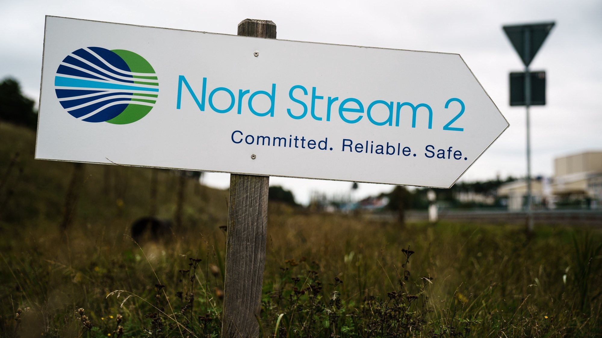 epa08748004 A sign reading ’Nord Stream 2 - Committed. Reliable. Safe.’ picutured near the pipeline landfall facility after a visit of Mecklenburg-Western Pomerania State Premier Manuela Schwesig (not in the picture) to the industrial port and the landfall facility of the joint German-Russian pipeline project Nord Stream 2, in Lubmin, Germany, 15 October 2020. The politically controversial pipeline project was put into question in response to the alleged poisoning of Kreml critic Alexei Navalny. Schwesig wants to save the gas pipeline that she regards an important infrastructure project.  EPA/CLEMENS BILAN