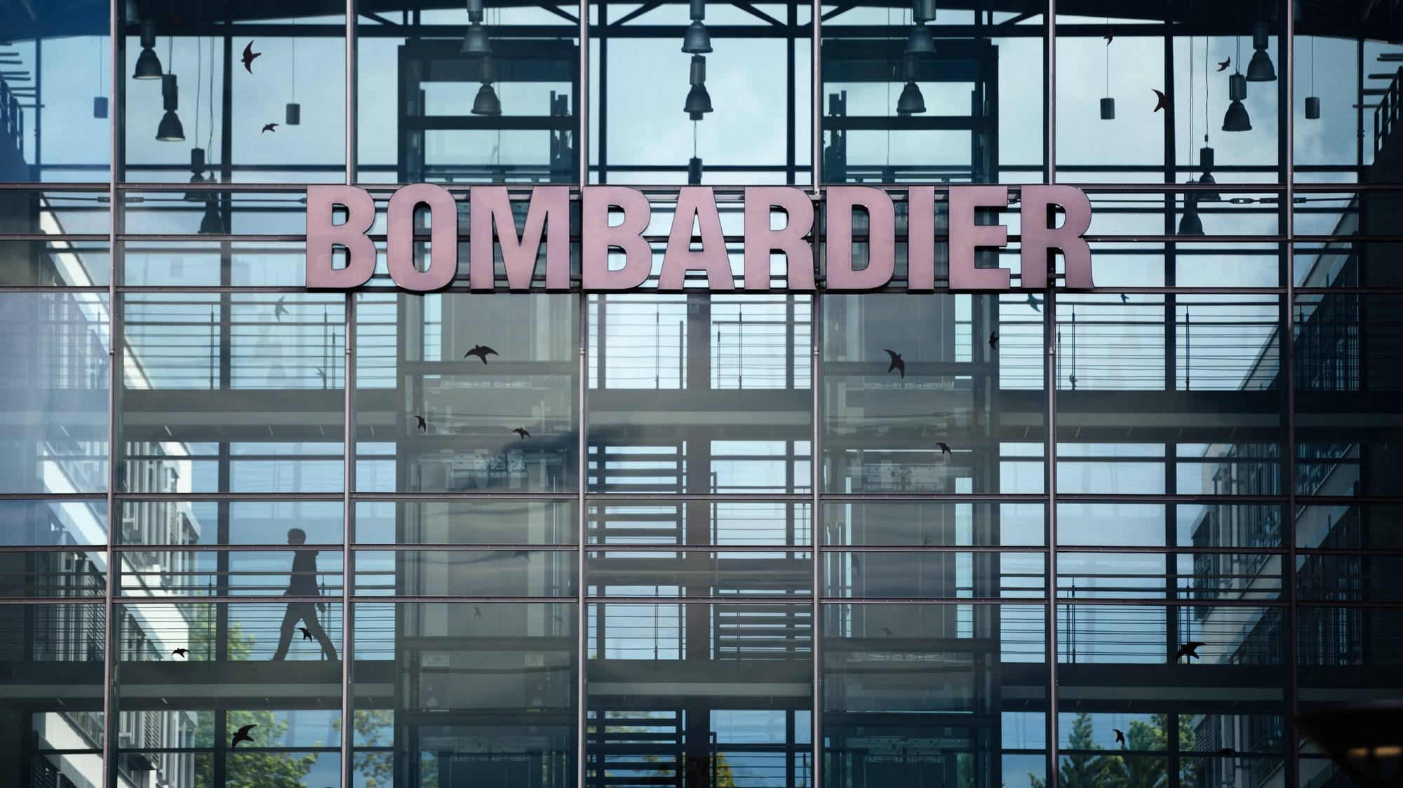 epa08577074 (FILE) - An exterior view of Canadian train manufacturer Bombardier Transportation in Henningsdorf, near Berlin, Germany, 08 July 2019 (reissued 31 July 2020). Reports on 31 July 2020 state the EU competition authorities have on 31 July 2020 agreed to planned takeover of Bombardier Transportation by French Alstom in a deal valued at some 6.2 billion euro, according to German media reports. One condition, however, is that as promised by Alstom, the Bombardier production facilities at the Hennigsdorf site near Berlin will be sold, as the EU Commission announced on 31 July 2020.  EPA/JENS SCHLUETER *** Local Caption *** 55880275