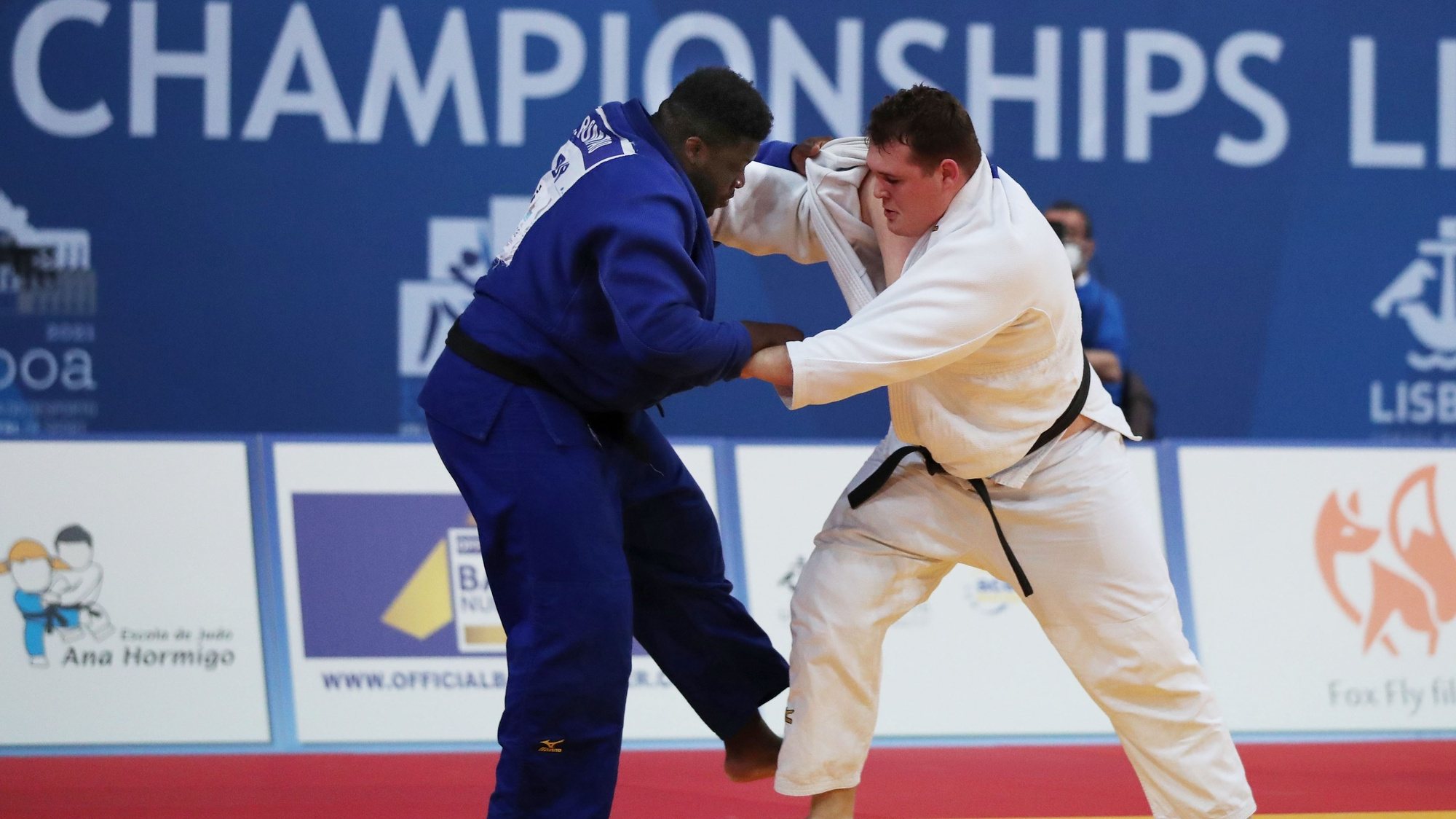 Vasco Rompão of Portugal (blue) and Jonas Schreiber of Germany (white) in action during the round one match in the men&#039;s +100kg category at the European Judo Championships in Lisbon, Portugal, 18 April 2021. NUNO VEIGA/LUSA