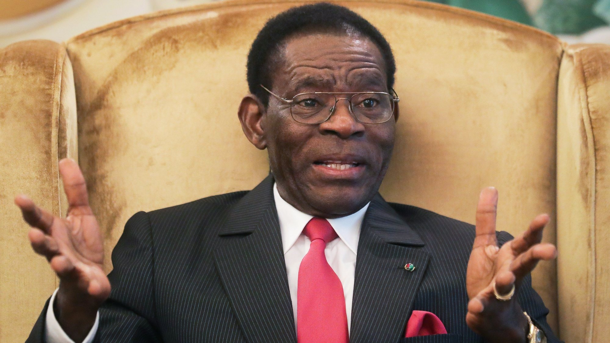 epa09061239 (FILE) - The President of Equatorial Guinea Teodoro Obiang speaks during a meeting with members from a delegation from the Community of Portuguese Speaking Countries (CPLP), responsible for the observations of the Legislative and Municipal Elections, at the Presidential Palace in Malabo, Equatorial Guinea, 10 November 2017 (reissued 08 March 2021). Equatorial Guinea&#039;s main city Bata has been rocked by several explosions on 07 March, President Teodoro Obiang Nguema Mbasogo said in an official statement, blaming negligence and carelessness of a unit in charge of explosives at a military base.  EPA/MARIO CRUZ *** Local Caption *** 54161279