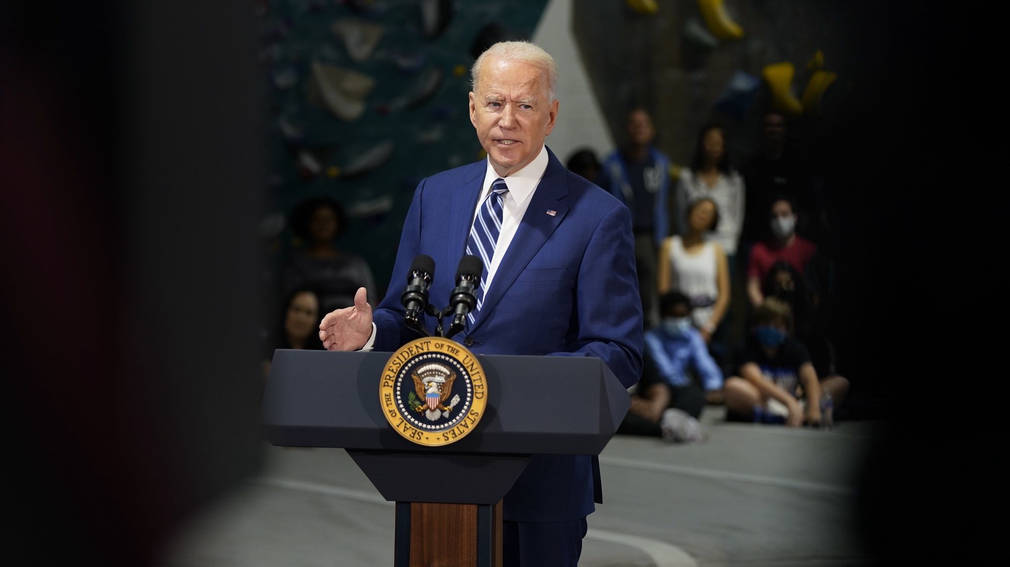epa09233713 US President Joe Biden delivers remarks at Sportrock Climbing Center in Alexandria, Virginia, USA, 28 May 2021, to celebrate the significant progress Virginia has made in the fight against COVID-19, in partnership with the Biden-Harris Administration.  EPA/Chris Kleponis / POOL