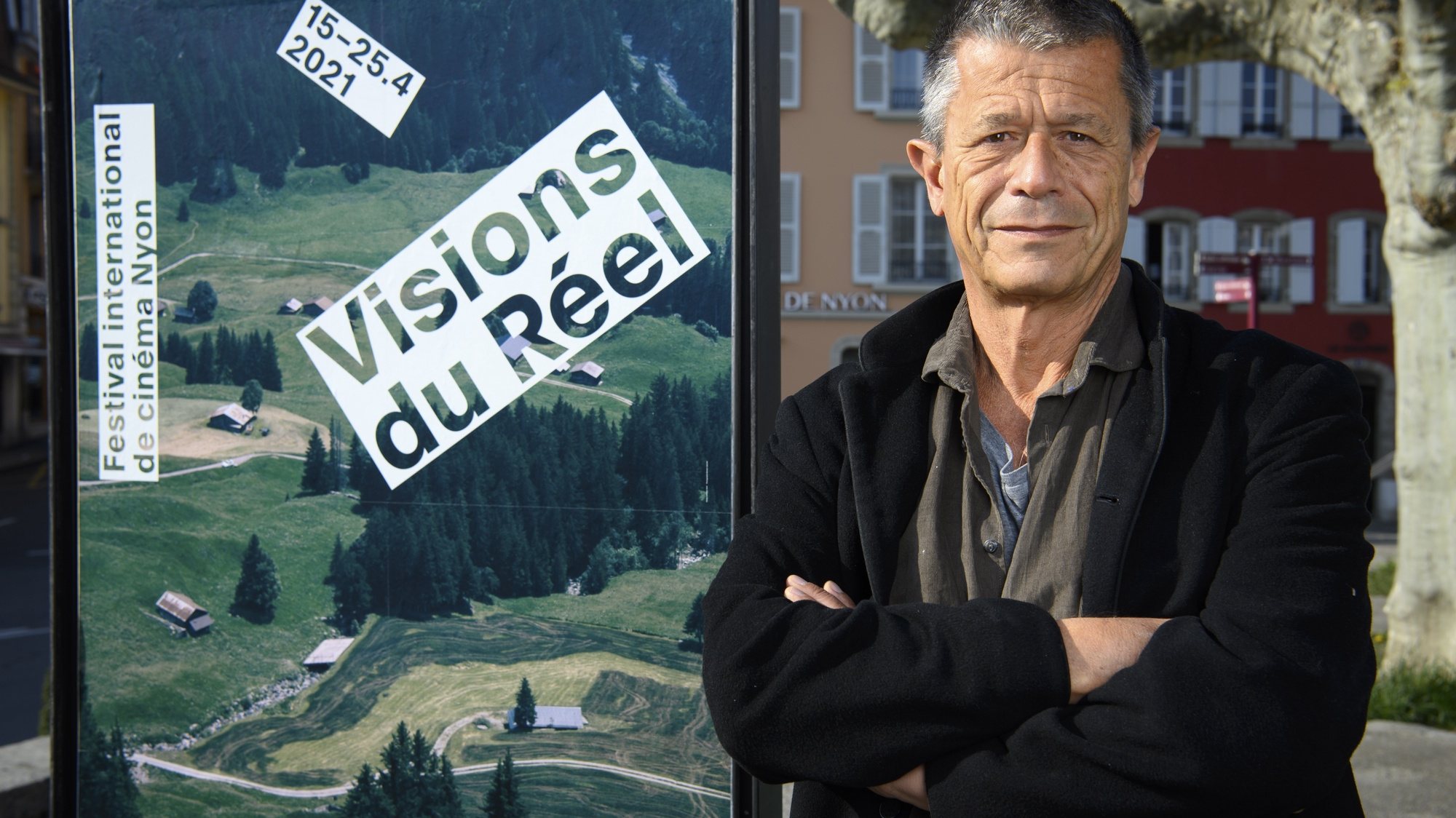 epa09144751 France&#039;s author, screenwriter and film director Emmanuel Carrere poses for the photographer during the documentary film festival Visions du Reel (Visions of Reality) in Nyon, Switzerland, 19 April 2021.  EPA/LAURENT GILLIERON
