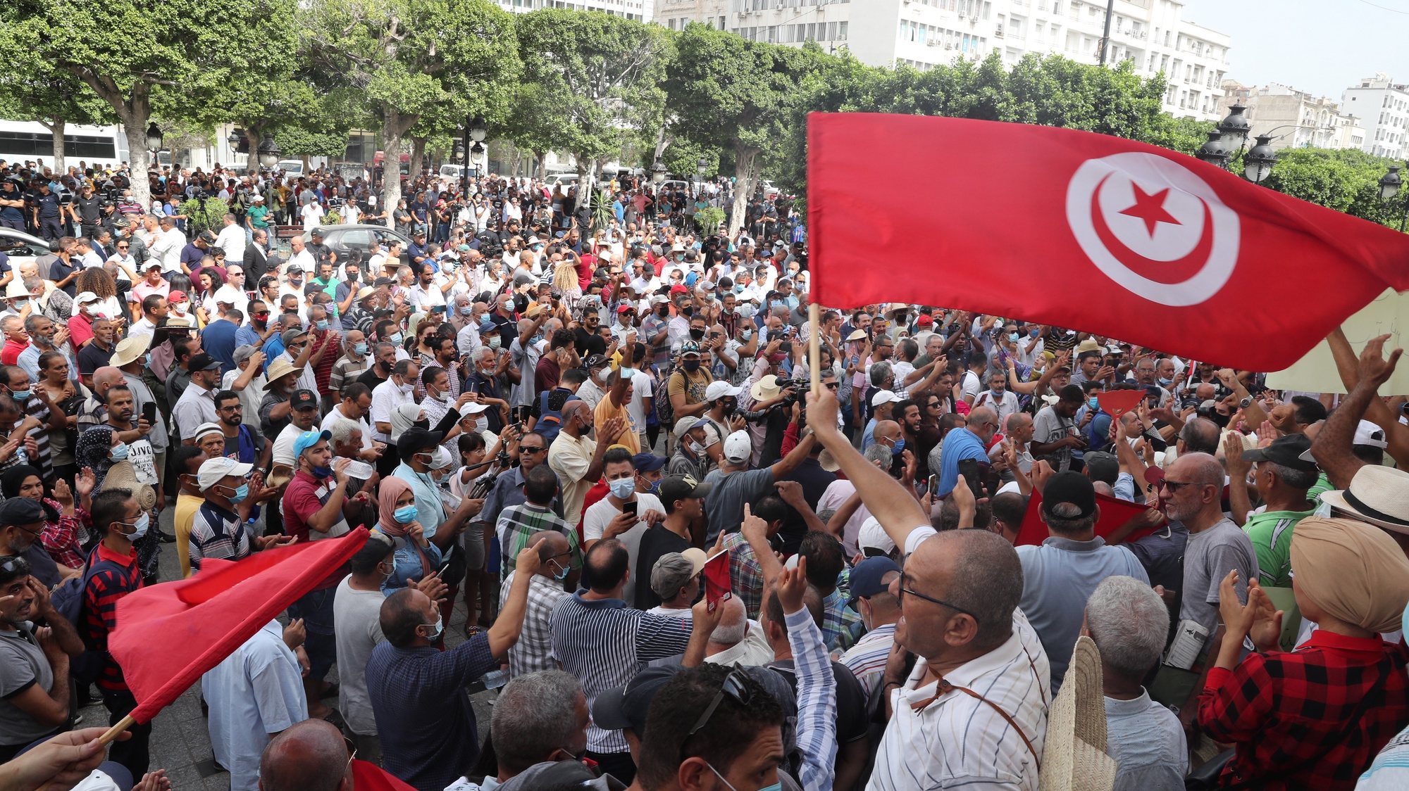 epa09474832 Opponents of Tunisia&#039;s President Kais Saied shout slogans as they take part in a protest against what they call his coup on 25 July, in Tunis, Tunisia, 18 September 2021. Tunisian President Saied suspended the country&#039;s parliament and dismiss the Prime Minister, Hichem Mechichi on 25 July 2021.  EPA/MOHAMED MESSARA