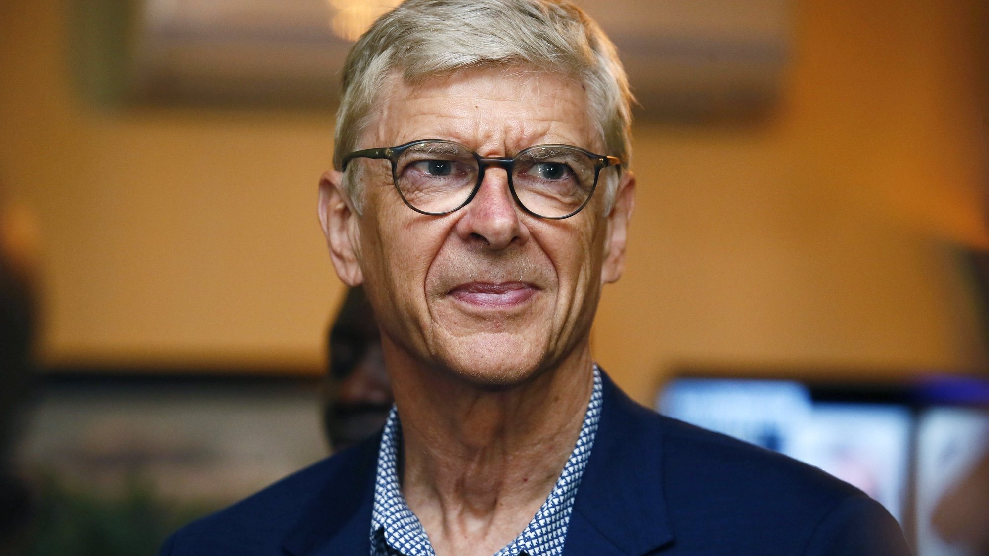 epa06965332 Former soccer coach Arsene Wenger arrives at the Roberts International Airport in Harbel, Liberia, 22 August 2018. Liberian president George Weah is to award his former coach Arsene Wenger his country&#039;s highest honour on 23 August 2018.  EPA/AHMED JALLLANZO