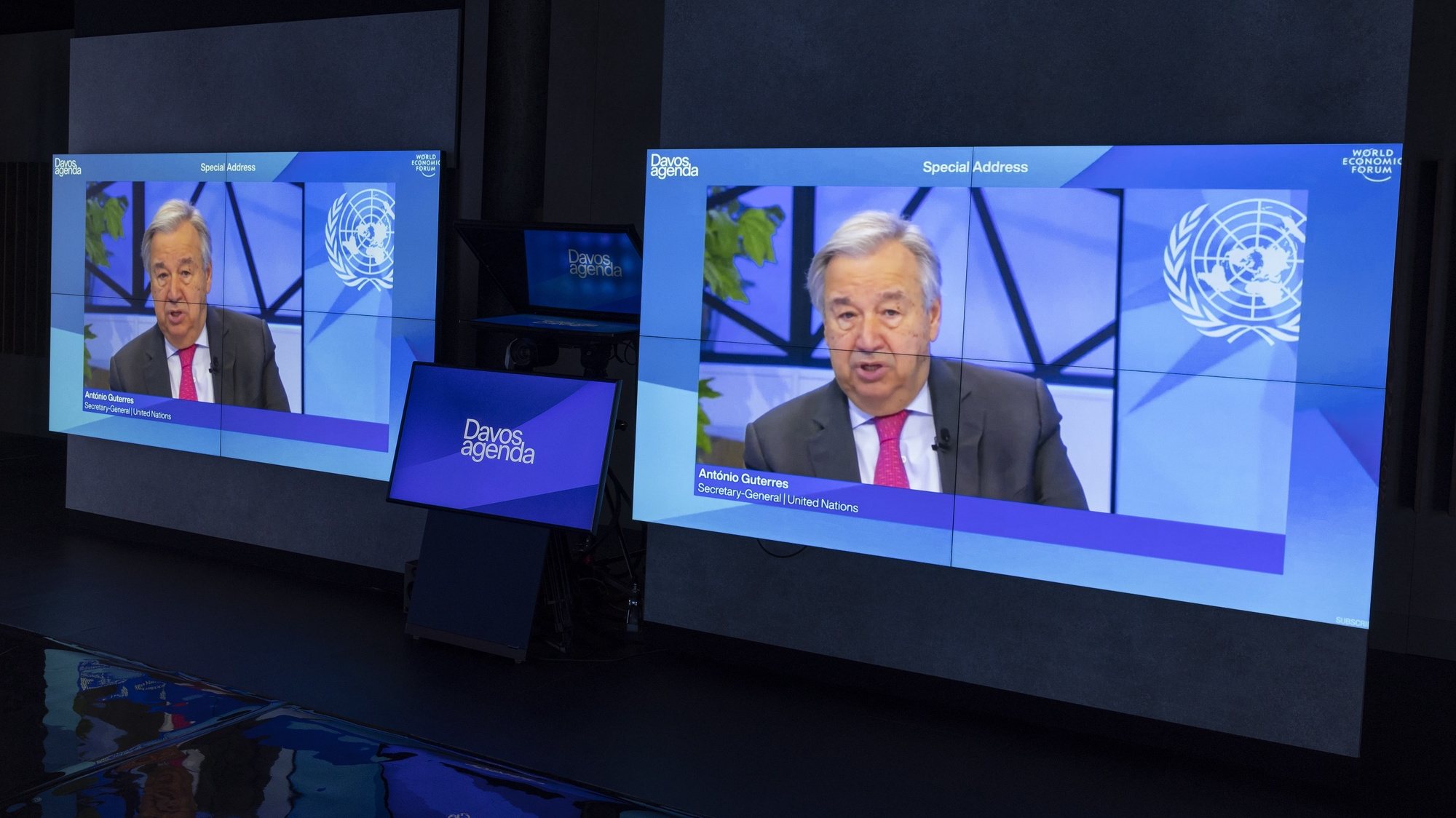 epa09691518 Screens show the U.N. Secretary-General Antonio Guterres delivering his statement during the Davos Agenda 2022, in Cologny near Geneva, Switzerland, 17 January 2022. The Davos Agenda 2022 will be hosted virtually due to the Coronavirus pandemic. Global leaders will gather through a series of virtual plenaries to shape the principles, policies and partnerships needed in this challenging context.  EPA/SALVATORE DI NOLFI