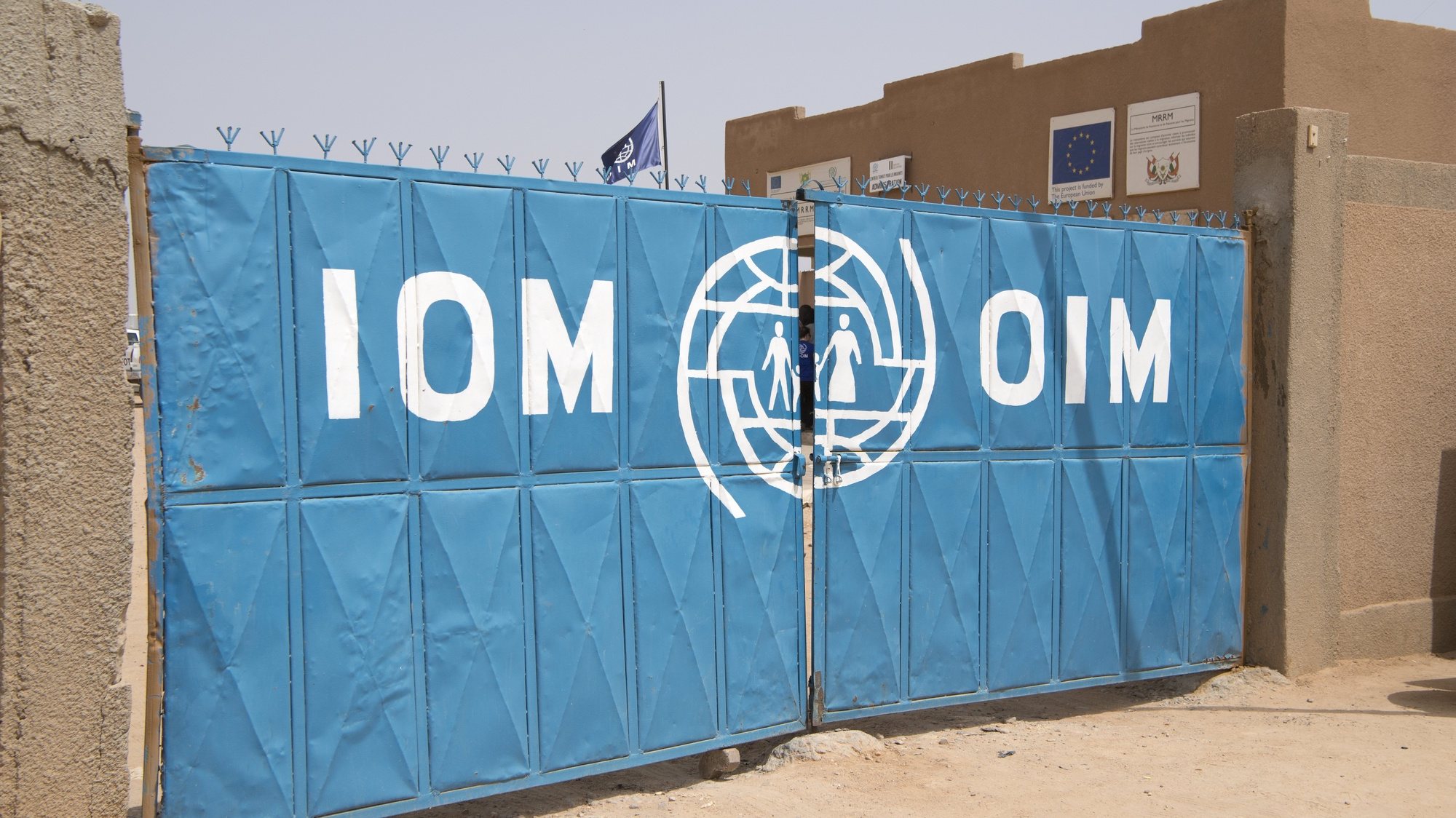 epa06247573 The entrance of a migrant reception center of the International Organization for Migration (IOM) during a working visit of Swiss Federal Councillor Simonetta Sommaruga (not pictured), in Agadez, Niger, 05 October 2017.  EPA/ANTHONY ANEX