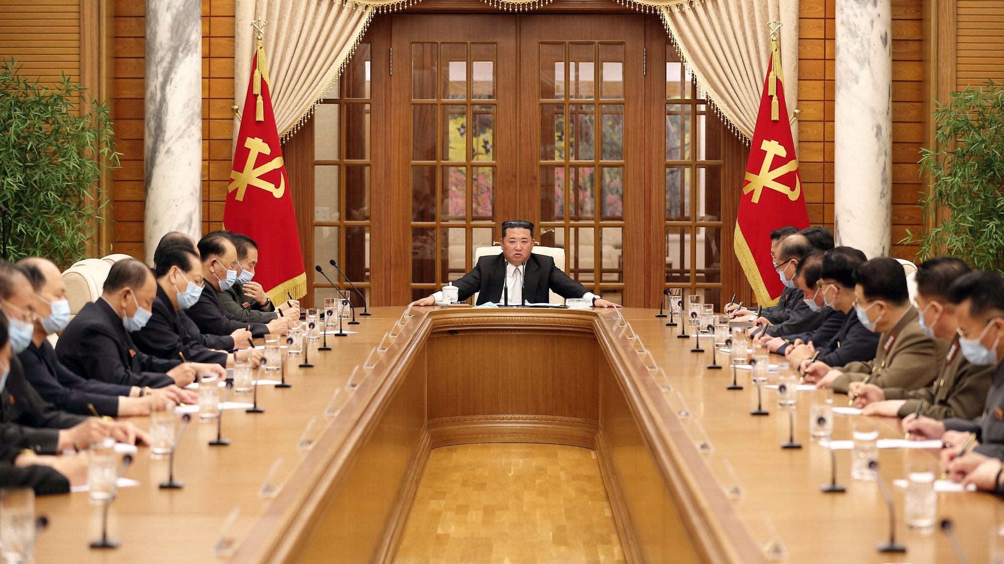 epa09941460 A photo released by the official North Korean Central News Agency (KCNA) shows the meeting of the 8th Political Bureau of 8th Central Committee of the WPK, convened at the office building of the Party Central Committee in Pyongyang, North Korea, 12 May 2022. Kim Jong-un (C), general secretary of the Workers&#039; Party of Korea (WPK), presented at the meeting, held to organize the government&#039;s response to an outbreak of COVID-19 in Pyongyang.  EPA/KCNA   EDITORIAL USE ONLY