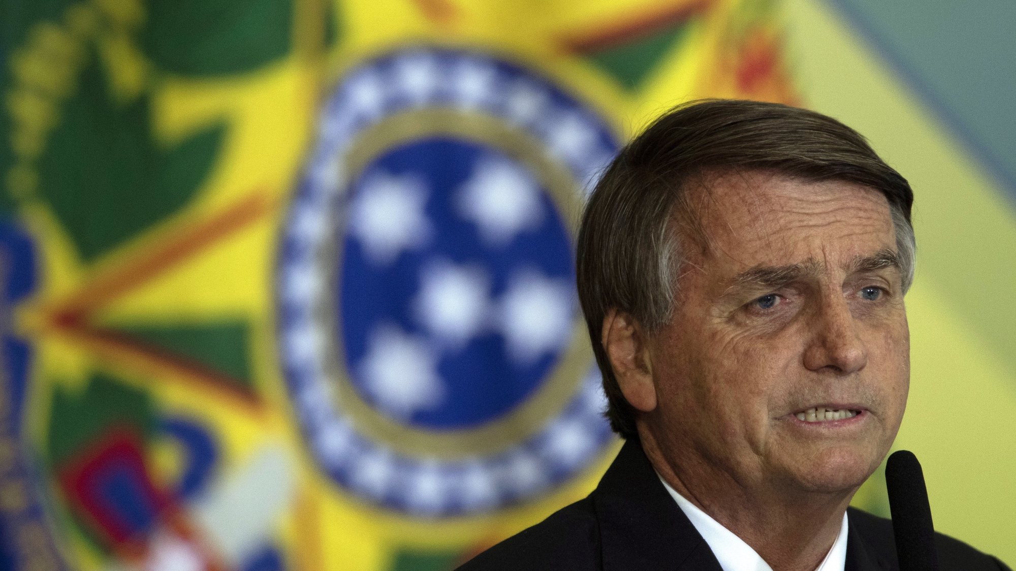 epa10024482 The President of Brazil Jair Bolsonaro, speaks, while participating in an act of National Policy for the Recovery of Learning in Basic Education, and the MECPlace, Innovation Ecosystem, and Digital Educational Solutions, at the Palacio do Planalto, in Brasilia, Brazil, 20 June 2022.  EPA/Joedson Alves
