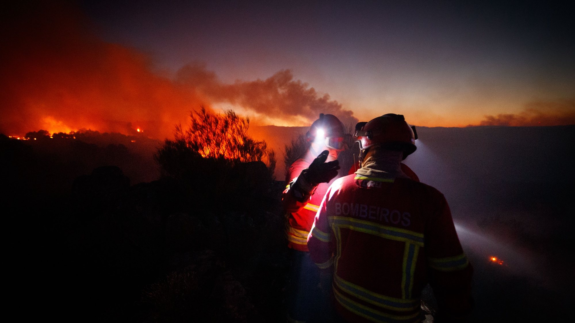 Firemen fights a forest fire in Reboredo village, Vila Pouca de Aguiar, Portugal, 28 July 2022. 466 operational, 144 vehicles and 06 airplane are fighting the forest fire. PEDRO SARMENTO COSTA/LUSA