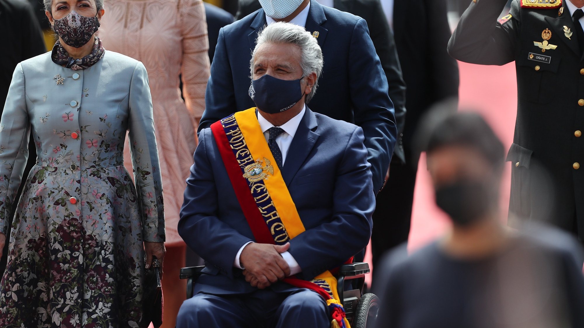 epa09225389 Ecuadorian outgoing President Lenin Moreno (C), accompanied by his family, arrives for the inauguration ceremony of Ecuador&#039;s President-elect Lasso in Quito, Ecuador, 24 May 2021.  EPA/Jose Jacome