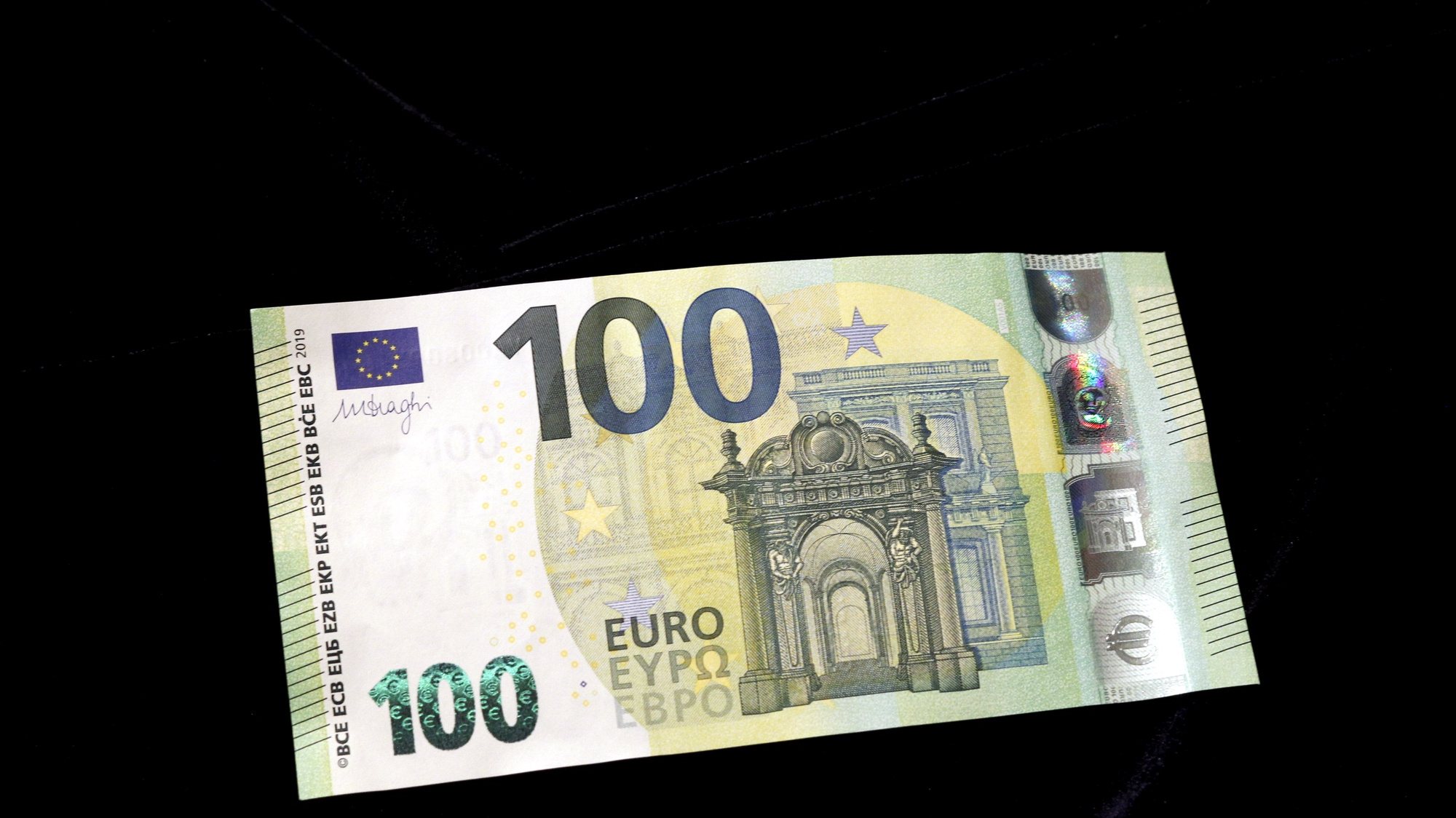 epa07596704 A view of new 100 euro banknote in Riga, Latvia, 24 May 2019. Latvia will be launching new 100 euro and 200 euro banknotes On 28th May 2019. These are the latest European series of banknotes with refurbished design and advanced security features.  EPA/Toms Kalnins