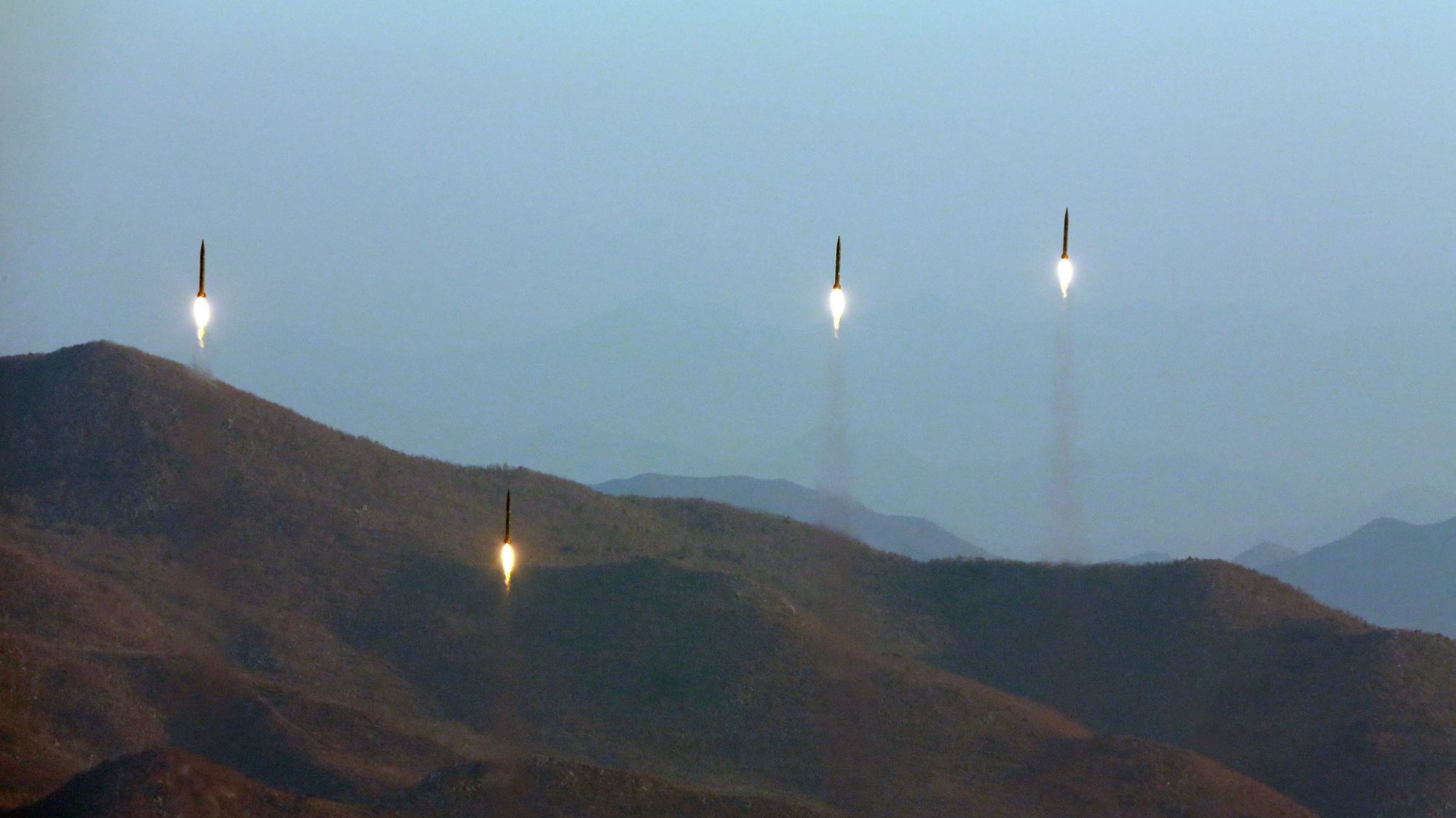 epa06163494 (FILE) - An undated photo made available by the North Korean Central News Agency (KCNA), the state news agency of North Korea, on 07 March 2017, shows four projectiles during a ballistic rocket launching drill of Hwasong artillery units of the Strategic Force of the Korean People&#039;s Army (KPA) at an undisclosed location, North Korea  (reissued 26 August 2017). According to the South Korean military, North Korea has test-fired several short-range unidentified projectiles into the sea from the eastern Kangwon province on 26 August 2017. North Korea has threatened to launch missiles on Guam, where US tactical bombers are based, after it fired a missile landed in Japan&#039;s exclusive economic zone (EEZ), west of Japanese northern island of Hokkaido on 28 July 2017.  EPA/KCNA   EDITORIAL USE ONLY