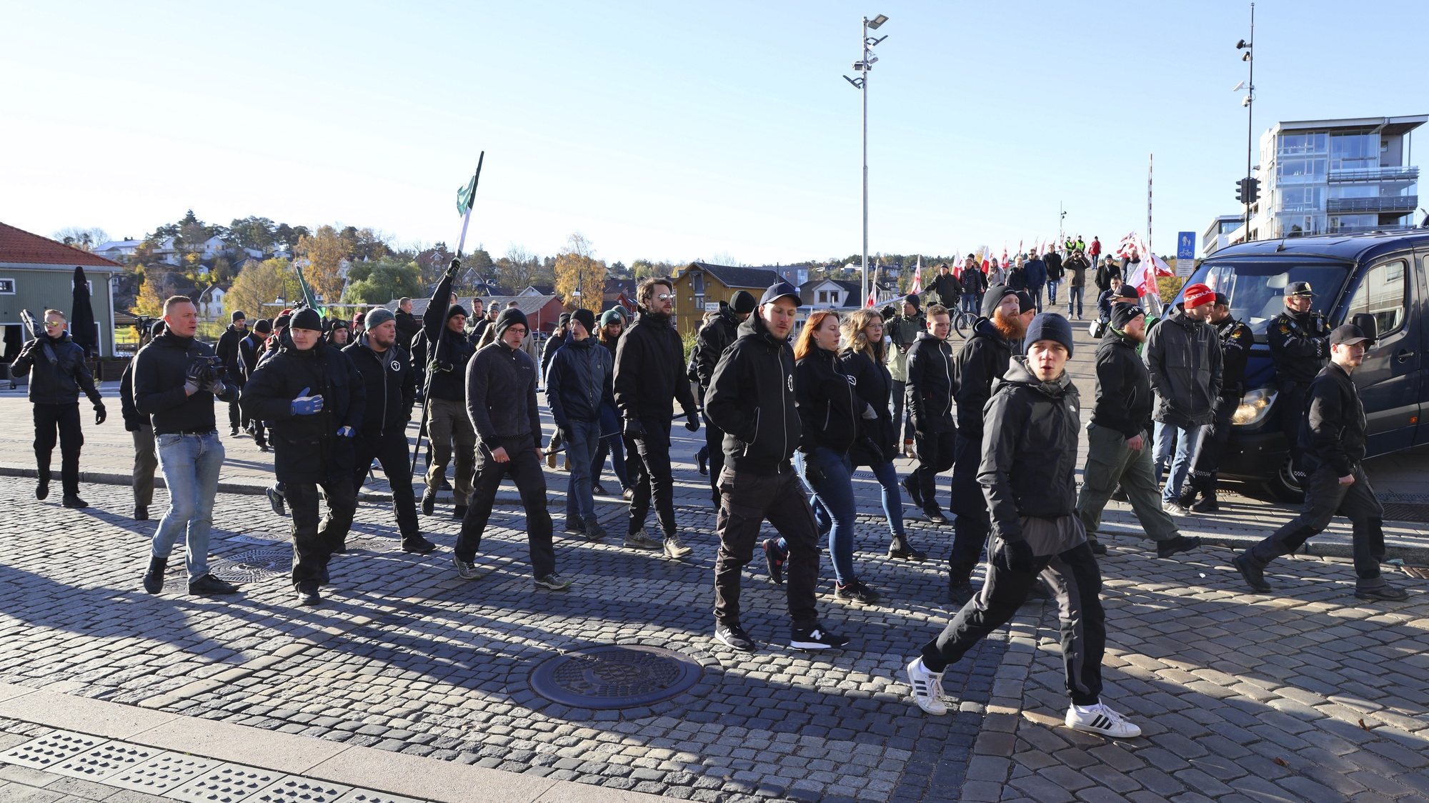 epa07123776 Members of neo-nazi organization Nordic Resistance Movement march during demonstration in Fredrikstad, Norway, 27 October 2018.  EPA/Oern Borgen  NORWAY OUT