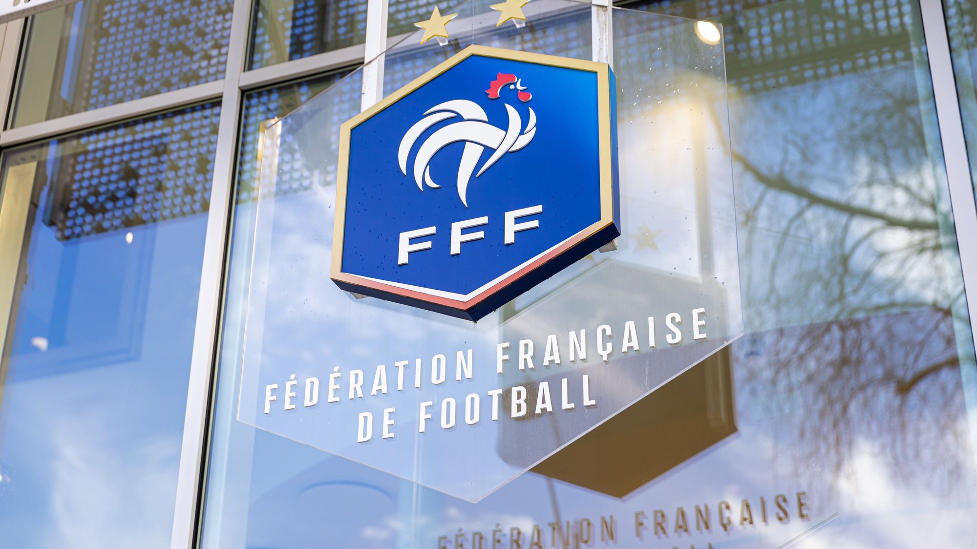 epa10399600 The logo of the French Football Federation (FFF) in front of its headquarters prior to an extraordinary executive committee meeting  in Paris, France, 11 January 2023. FFF President Noel Le Graet is expected to offer an explanation for controversial comments about Zinedine Zidane.  EPA/CHRISTOPHE PETIT TESSON