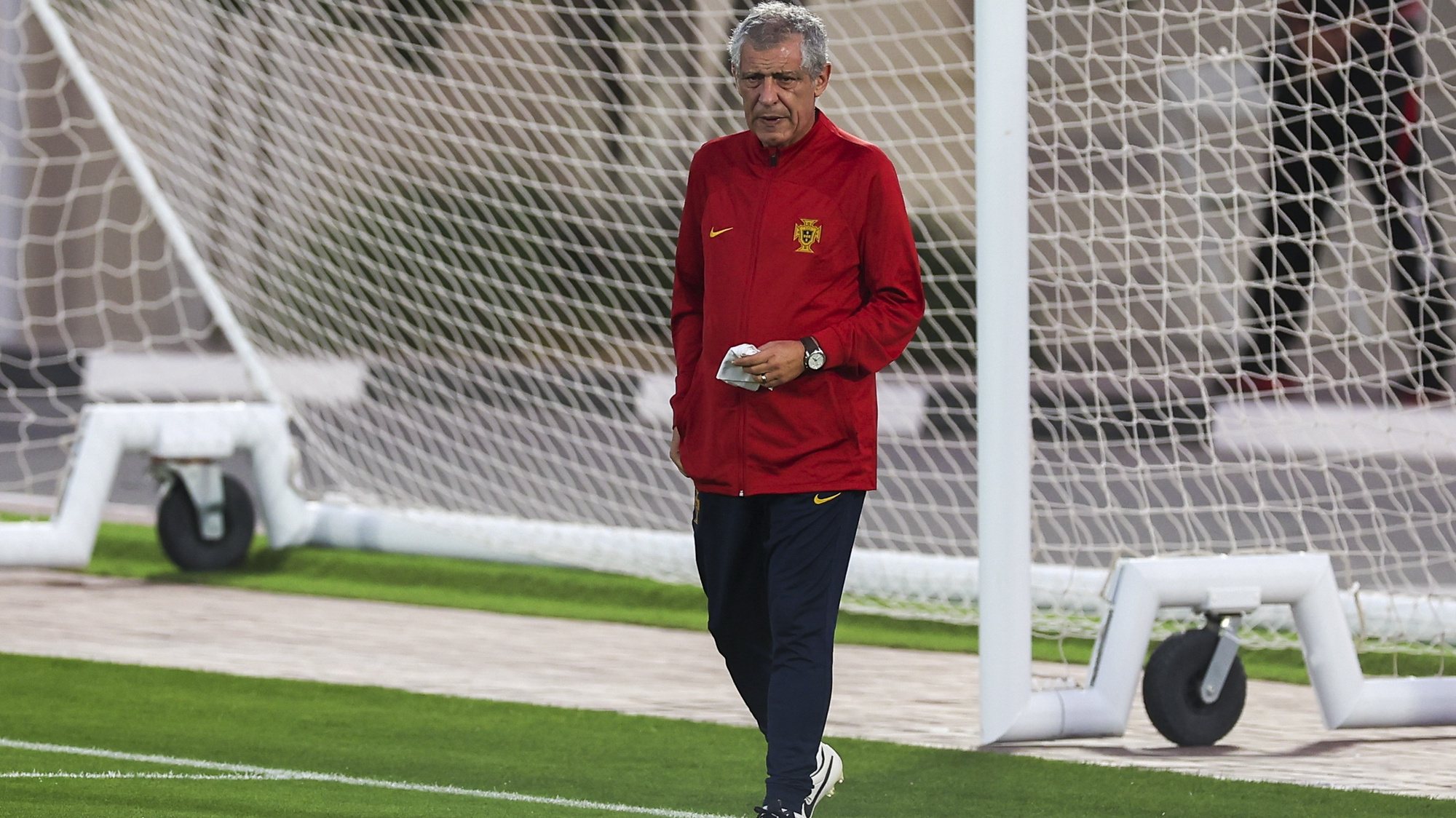 epa10356750 Portugal head coach Fernando Santos watches his players during a training session in Al-Shahaniya, Qatar, 09 December 2022.  Portugal will face Morocco in their FIFA World Cup 2022 quarter final soccer match on 10 December 2022.  EPA/JOSE SENA GOULAO PORTUGAL OUT