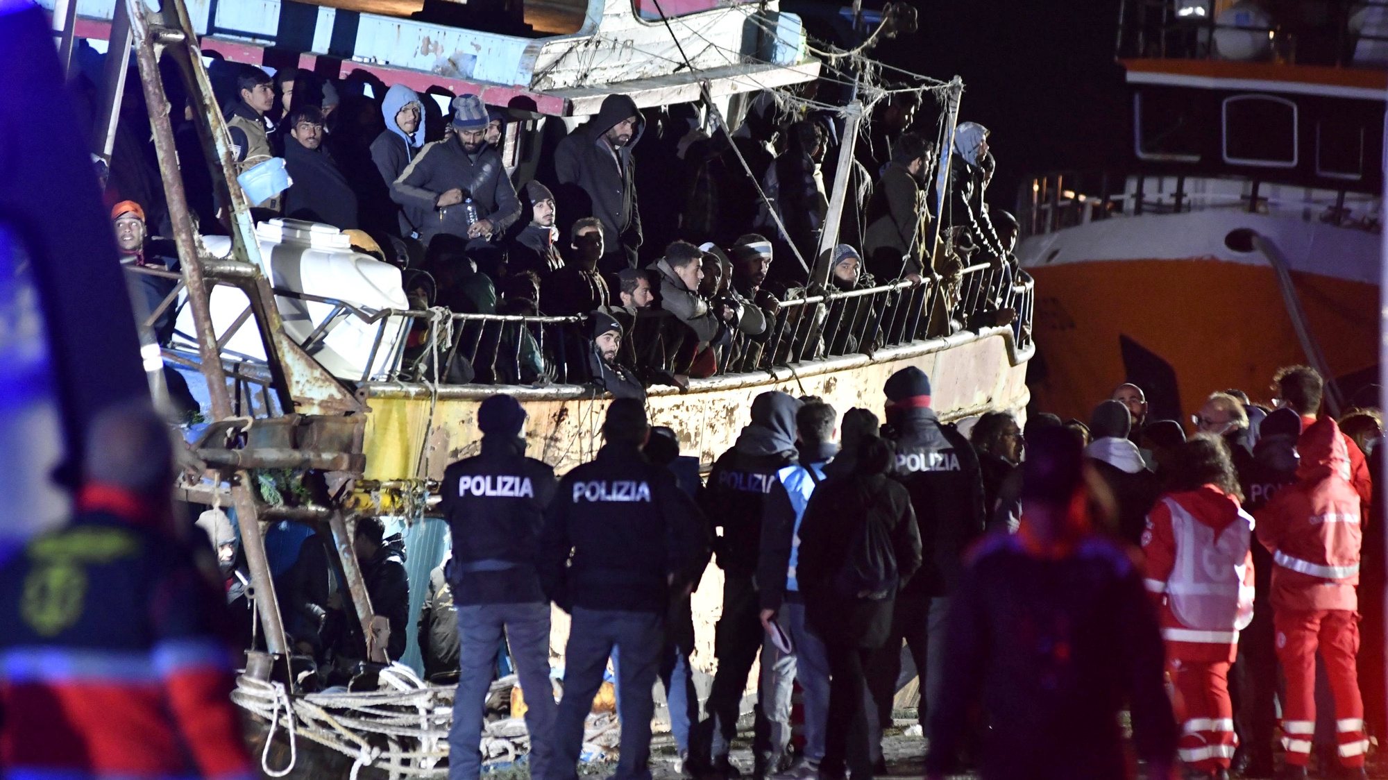 epa10514648 A boat carrying around 500 migrants arrives at the port in Crotone, Italy, 11 March 2023. The migrants were rescued off the coast of Calabria by the coast guard.  EPA/GIUSEPPE PIPITA BEST QUALITY AVAILABLE