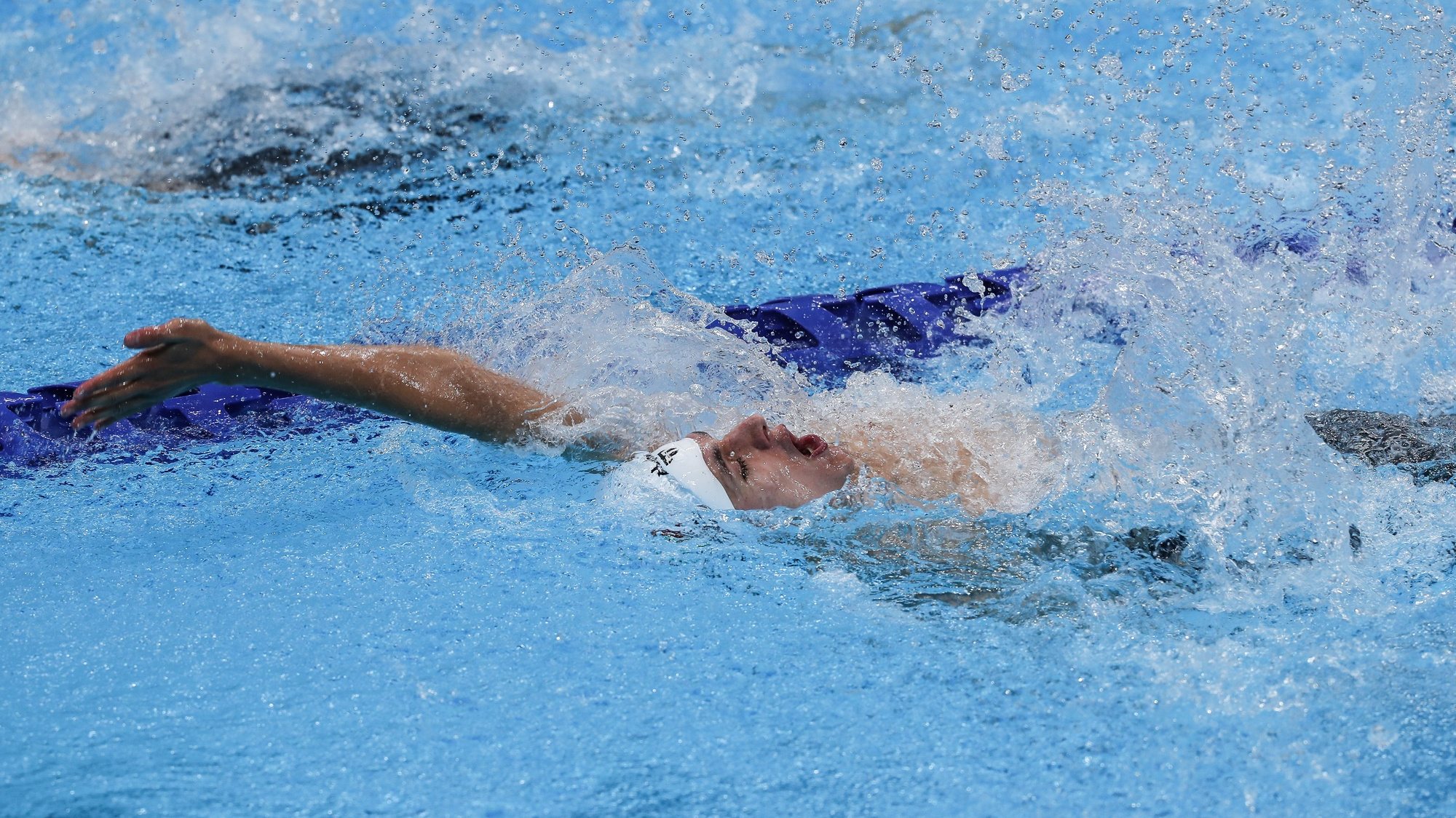 O nadador português, Marco Meneses em ação na final da prova masculina de natação de 100 metros costas  S11 esta tarde no Centro Aquatico de Tóquio, nos jogos Paralímpicos de Toquio 2020, Japão, 28 de agosto de 2021. MIGUEL A. LOPES/LUSA