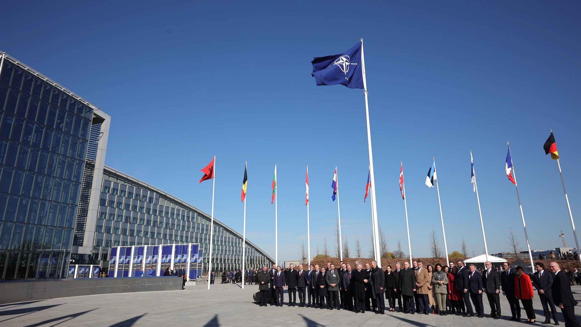 epa10558259 Officials attend a flag-raising ceremony for Finland&#039;s accession during NATO foreign ministers&#039; meeting at the Alliance&#039;s headquarters in Brussels, Belgium, 04 April 2023. Finland becomes the 31st member of the Alliance on 04 April.  EPA/OLIVIER MATTHYS / POOL