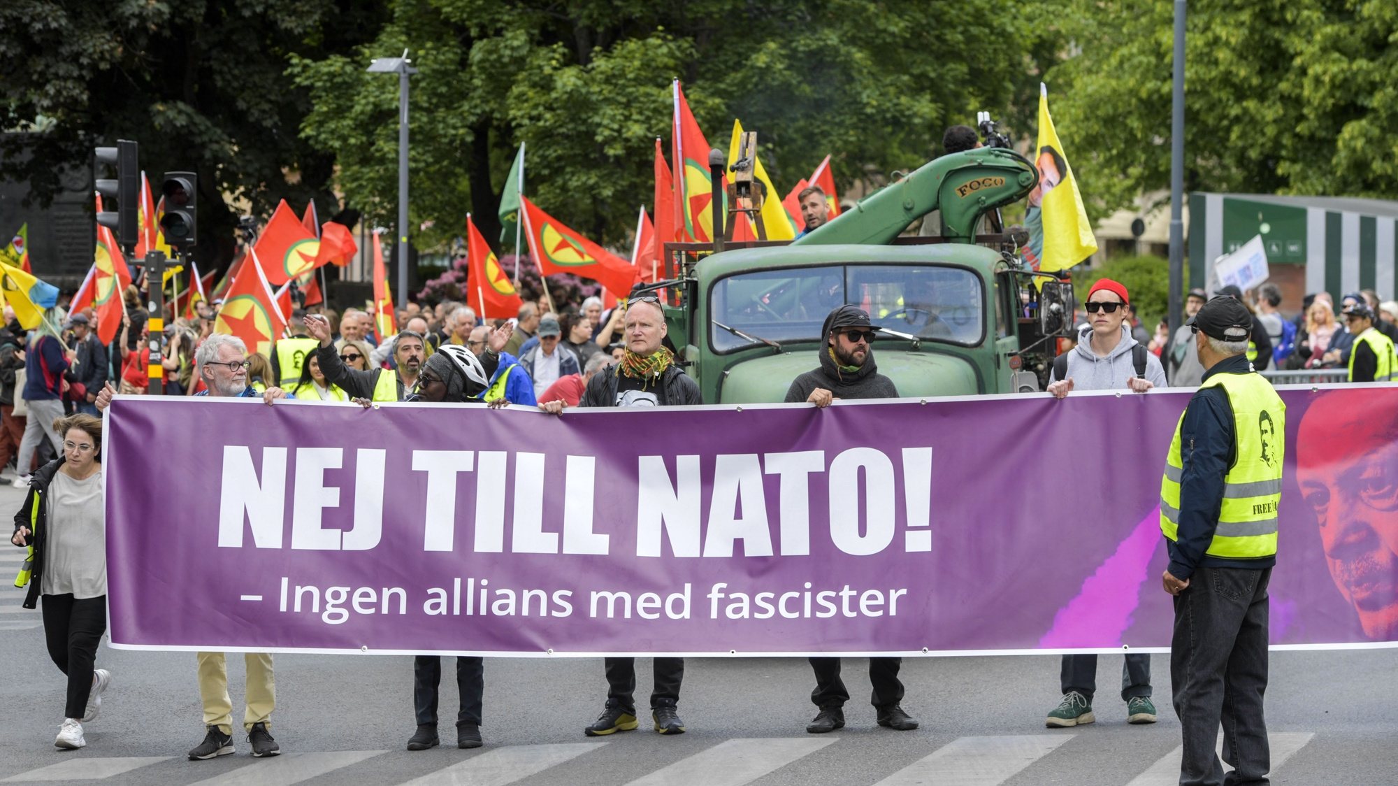 epa10672971 The Alliance Against NATO network stages a demonstration for freedom of speech, in support of democratic forces in Turkey, and against a Swedish NATO membership in Stockholm, Sweden, 04 June 2023. Finland submitted it application to join NATO following Russia&#039;s invasion of Ukraine in 2022. The banner reads &#039;No to NATO! - no alliance with fascists&#039;.  EPA/Maja Suslin/TT  SWEDEN OUT