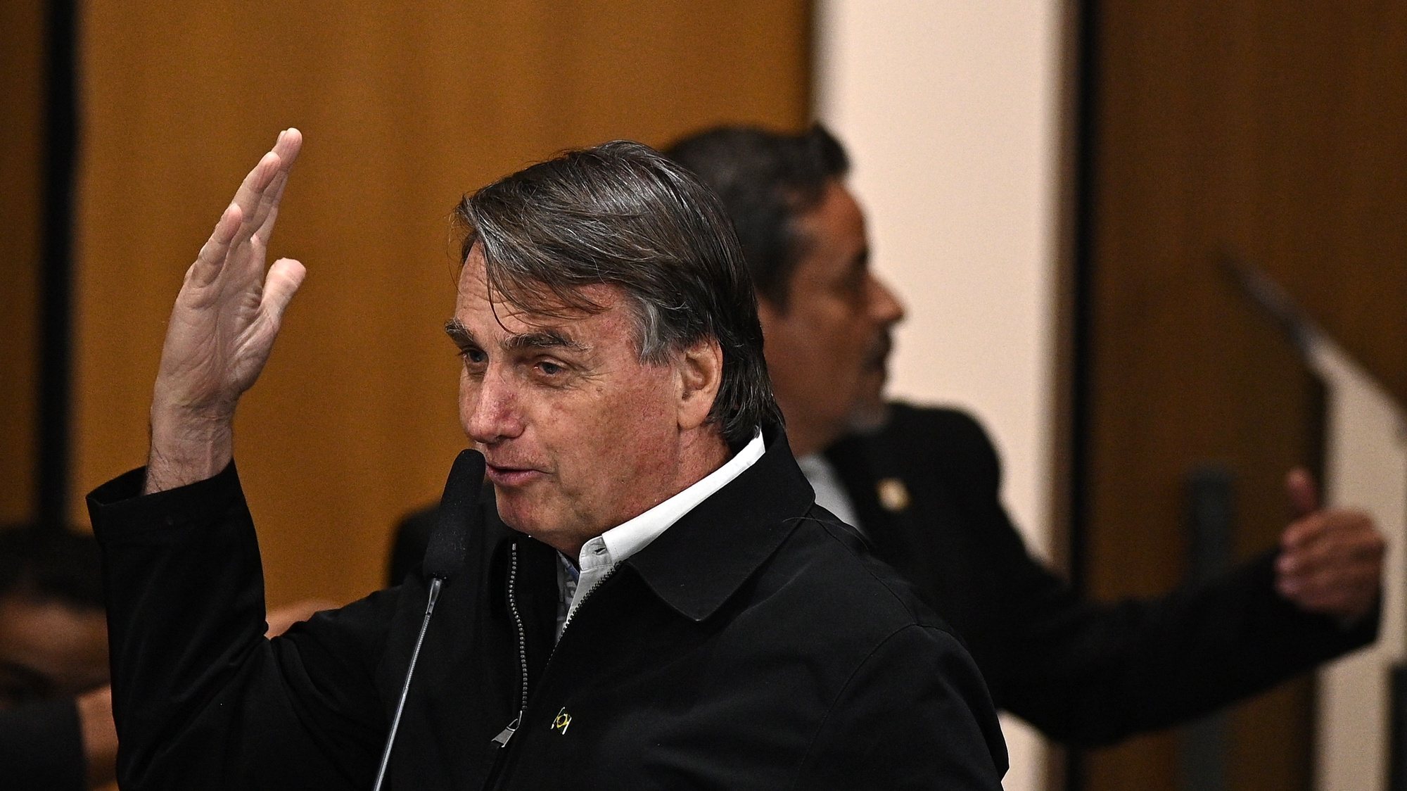 epa10806409 The former president of Brazil, Jair Bolsonaro, participates in a ceremony to receive the title of citizen of Goiania in the local legislative assembly in Goiania, Brazil, 18 August 2023.  EPA/Andre Borges