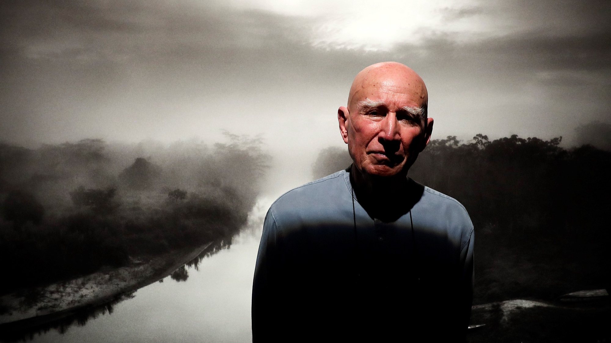 epa09756838 Brazilian documentary photographer Sebastiao Salgado poses for a photograph, during the press preview of his exhibition &#039;Amazonia&#039; at Sesc Pompeia, in Sao Paulo, Brazil, on 14 February 2022. The photographic exhibition features more than 200 images of Salgado, who spent more than six years in the Amazon working on the project, and will be open to the public from 15 February to 10 July.  EPA/Sebastiao Moreira