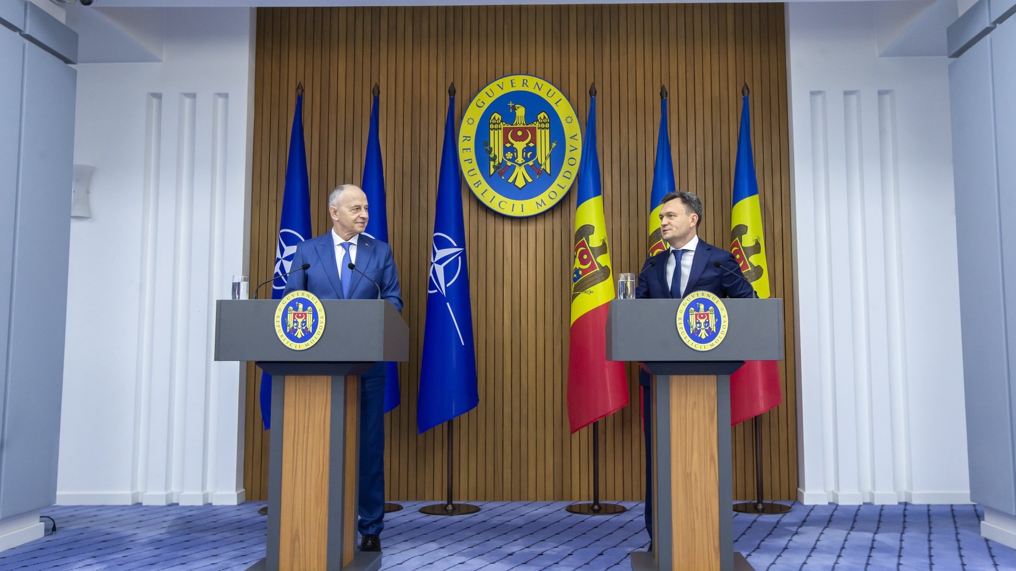 epa10860332 Deputy Secretary General of NATO, Mircea Geoana (L) with Prime Minister of the Republic of Moldova, Dorin Recean (R), at a joint press conference during the first of his three-day visit, in the government building in Chisinau, Moldova, 14 September 2023.  EPA/DUMITRU DORU
