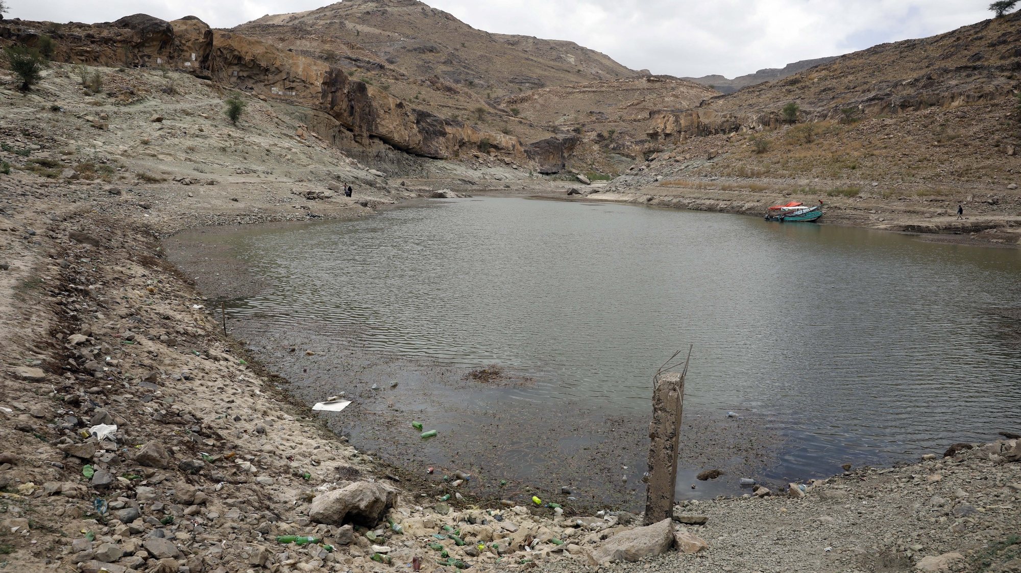 epa10817787 A drought-affected water reservoir during hot weather on the outskirts of Sana&#039;a, Yemen, 24 August 2023. The combination of a serious water shortage and the negative impacts of climate change, including low and intermittent rainfalls and droughts, in Yemen has aggravated water scarcity with over 17 million people out of the war-ravaged countryâ€™s 30-million population lacking access to safe water, according to estimates by the United Nations. Yemen is one of the most water-scarce countries in the world as it has no rivers, and rainfall has decreased significantly over the last few decades.  EPA/YAHYA ARHAB