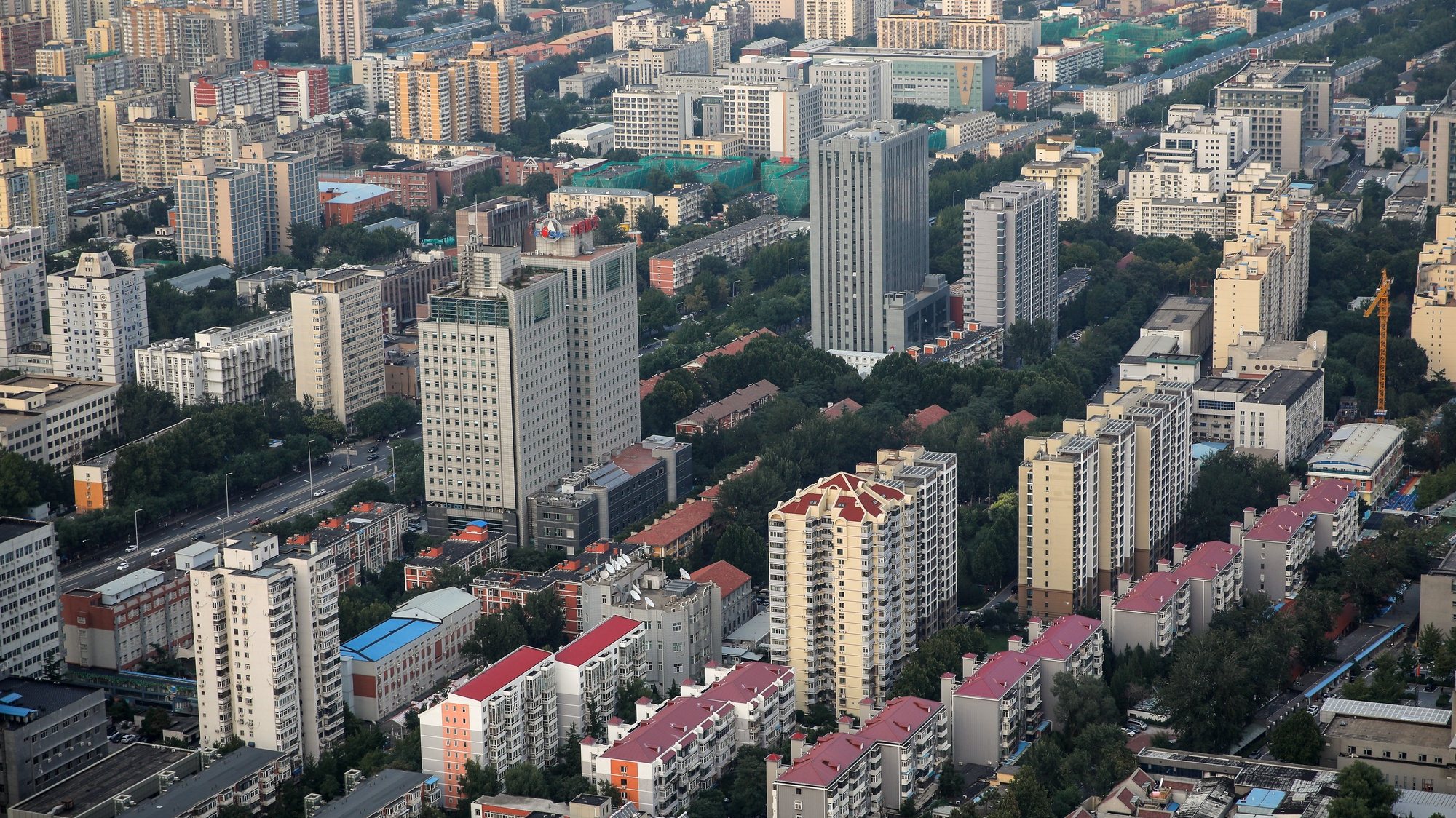 epa10854217 A general view of residential buildings in Beijing, China, 11 September 2023. Dalian and Shenyang in northeastern China, announced they will no longer restrict the amount of residential properties one can buy in most parts of the city, while offering subsidies for buyers and tax relief for sellers. These announcements come on the heels of a series of nationwide support measures for the property sector, including lower mortgage rates for first-time homebuyers.  EPA/WU HAO