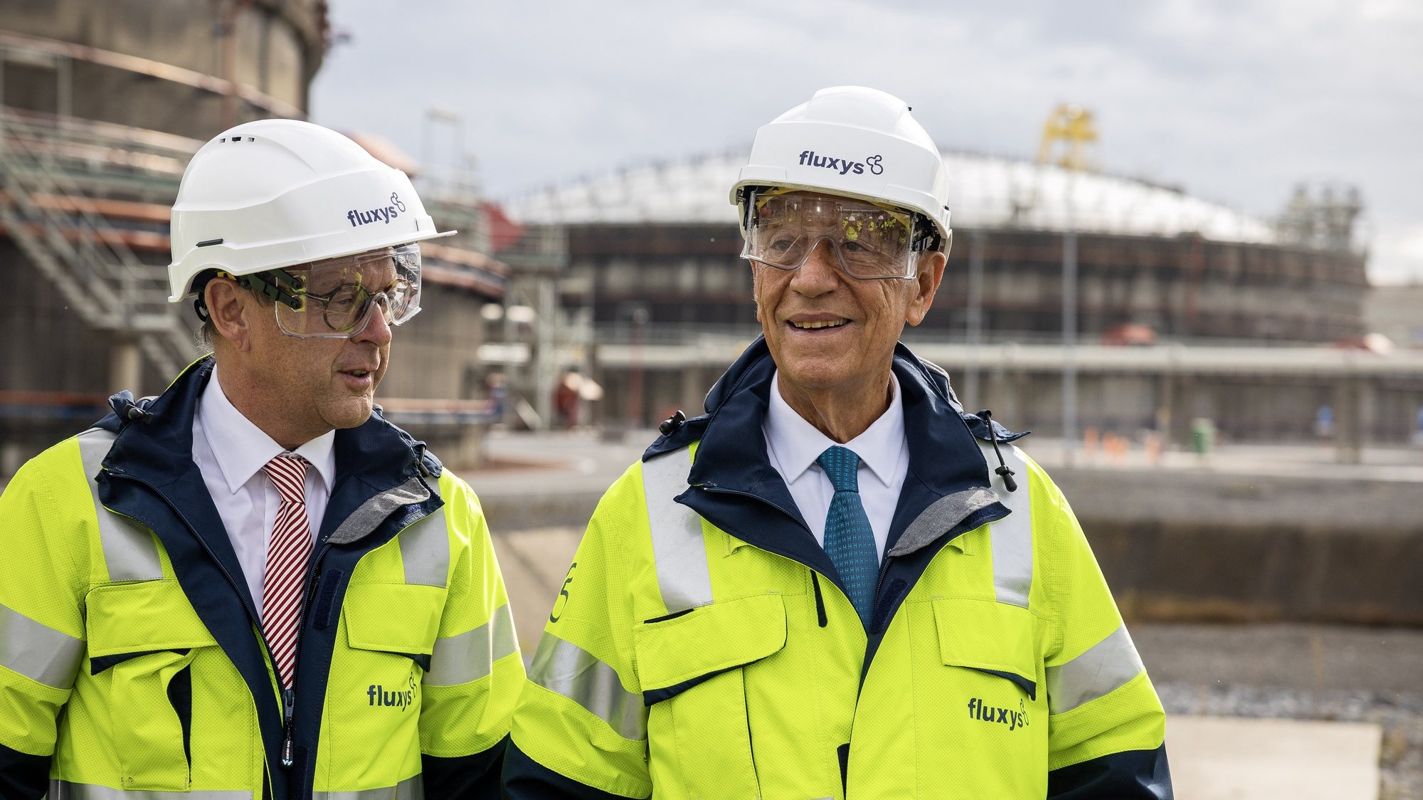 Portuguese President Marcelo Rebelo de Sousa (R) accompanied by Pascal De Buck, CEO of Fluxys Belgium (L), during a visit to Zeebrugge port, Brugge, Belgium, 19 October 2023. JOSE COELHO/LUSA