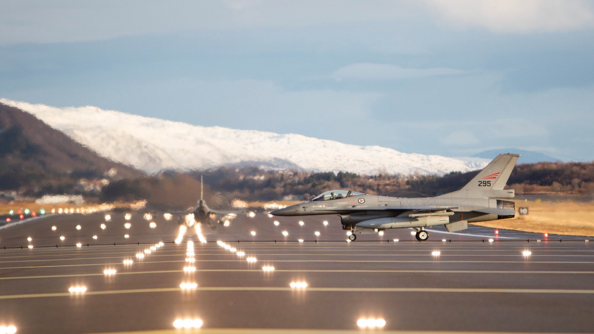 epa07136884 A handout photo made available by the Norwegian Armed Forces on 02 November 2018 shows a Norwegian F-16 preparing for take-off at Bodo Airport during Trident Juncture excercise in Norway, 31 October 2018. According to reports, some 50,000 participants from over 30 nations are expected to take part in the NATO-led military exercise in Norway from 25 October to 23 November 2018.  EPA/Hanne Hernes / Forsvaret HANDOUT  HANDOUT EDITORIAL USE ONLY/NO SALES *** Local Caption *** Norwegian F-16 getting ready to take off from Bodø Air Station during the exercise Trident Juncture 2018.