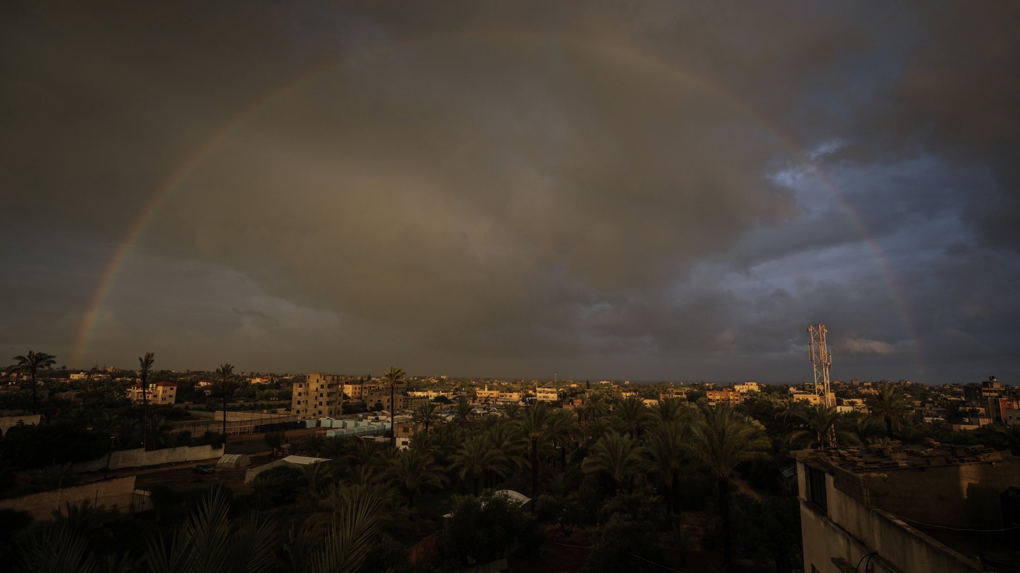 epa11068680 A rainbow over the southern Gaza Strip following a rain shower 11 January 2024. More than 22,800 Palestinians and at least 1,300 Israelis have been killed, according to the Palestinian Health Ministry and the Israel Defense Forces (IDF), since Hamas militants launched an attack against Israel from the Gaza Strip on 07 October, and the Israeli operations in Gaza and the West Bank which followed it. Since 07 October, up to 1.9 million people, or more than 85 percent of the population, have been displaced throughout the Gaza Strip, some more than once, according to the United Nations Relief and Works Agency for Palestine Refugees in the Near East (UNRWA), which added that most civilians in Gaza are in &#039;desperate need of humanitarian assistance and protection.  EPA/MOHAMMED SABER