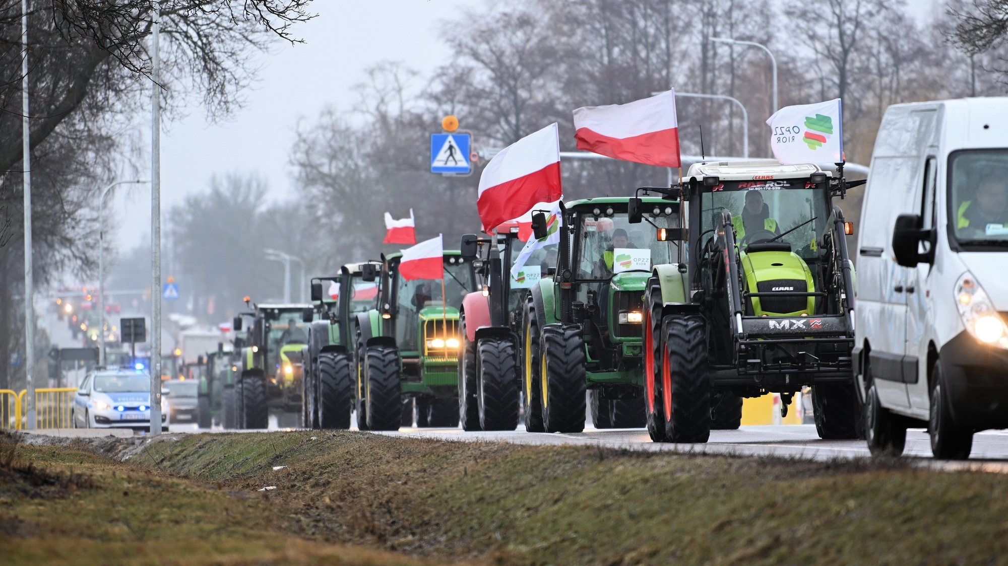 epa11101262 Polish farmers drive their tractors and other power equipment during a protest in Zbuczyn, central Poland, 24 January 2024. Farmers are staging nationwide protests in Poland under the slogan &#039;stop the current agricultural policy of the European Union&#039;, calling for restrictions on agricultural imports from Ukraine and non-EU countries.  EPA/Przemyslaw Piatkowski POLAND OUT