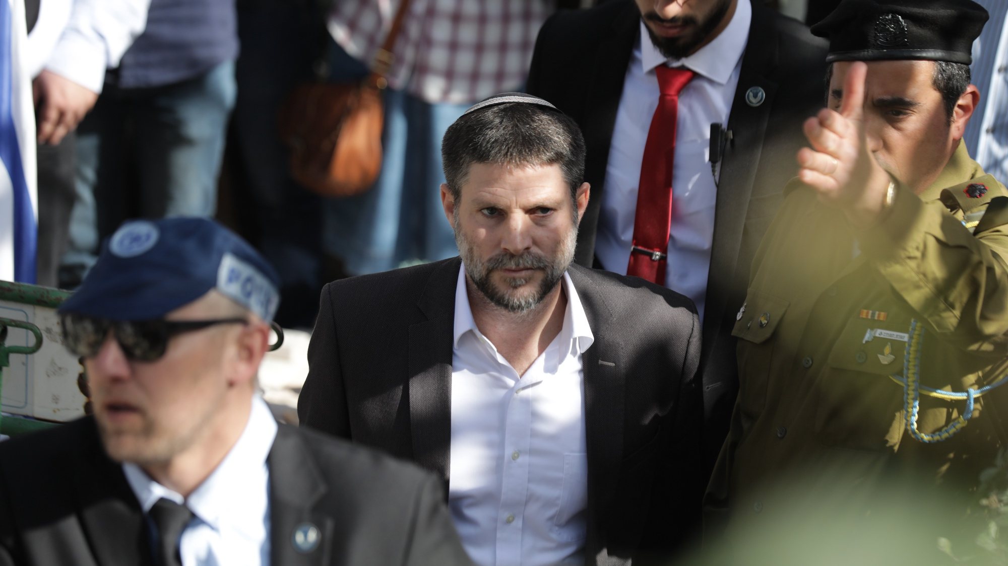 epa10493694 Israeli Finance Minister Bezalel Smotrich attends the funeral of two Israeli brothers Hillel and Yagel Yaniv at the Mount Herzl military cemetery in Jerusalem, 27 February 2023. Hillel and Yagel Yaniv were shot dead by a Palestinian driver on 26 February, as Israeli authorities said, near the Palestinian village of Hawara close to the city of Nablus in the West Bank.  EPA/ABIR SULTAN