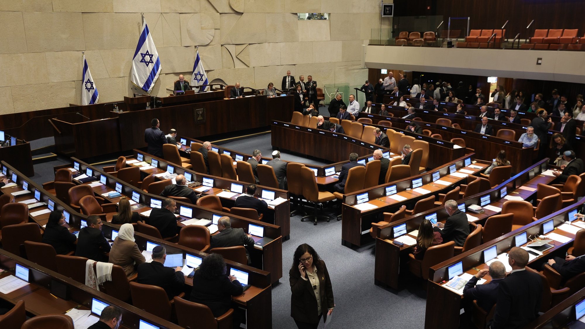 epa11166732 The Israeli Knesset votes over the impeachment of Hadash-Ta’al party MP Ofer Cassif in Jerusalem, 19 February 2024. The motion was brought up after Cassif publicly supported South Africa’s genocide case against Israel at the International Court of Justice (ICJ).  EPA/ABIR SULTAN
