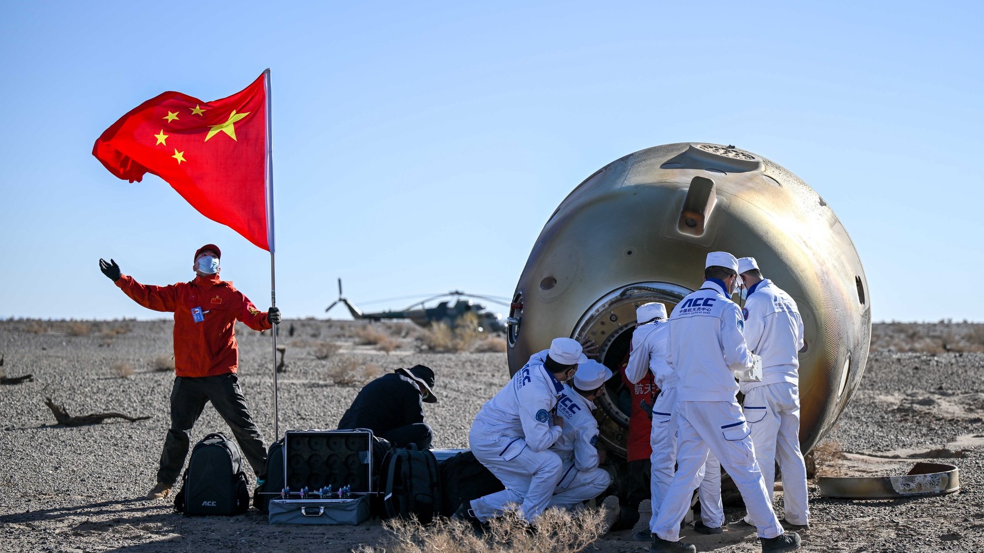 epa11310711 The return capsule of the Shenzhou-17 manned spaceship, carrying astronauts Tang Hongbo, Tang Shengjie and Jiang Xinlin, touches down at the Dongfeng landing site in north China&#039;s Inner Mongolia Autonomous Region, 30 April 2024. The three astronauts are all in good health, according to the China Manned Space Agency.  EPA/XINHUA / Lian Zhen CHINA OUT / UK AND IRELAND OUT  /       MANDATORY CREDIT  EDITORIAL USE ONLY  EDITORIAL USE ONLY