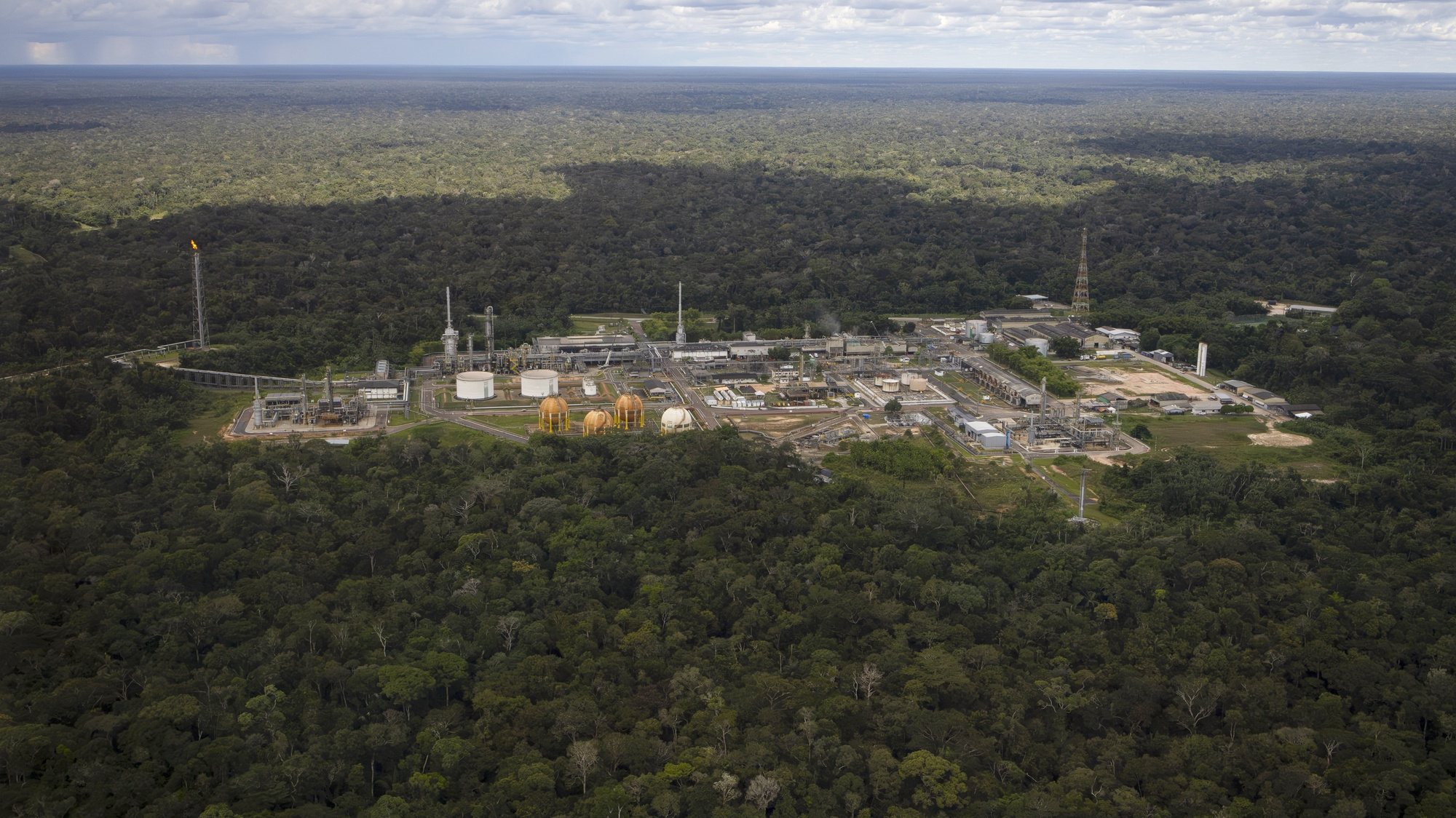 epa11302977 An aerial view of the Urucu oil district, in Coari, Amazonas, Brazil, 23 April 2024 (issued 26 April 2024). Urucu is an oil field located in one of the most well-preserved regions of the Amazon and operated by Petrobras. It supplies cooking gas to half of the Brazilian territory. Petrobras claims that it is feasible to extract hydrocarbons from the world&#039;s largest rainforest in a sustainable manner.  EPA/Isaac Fontana