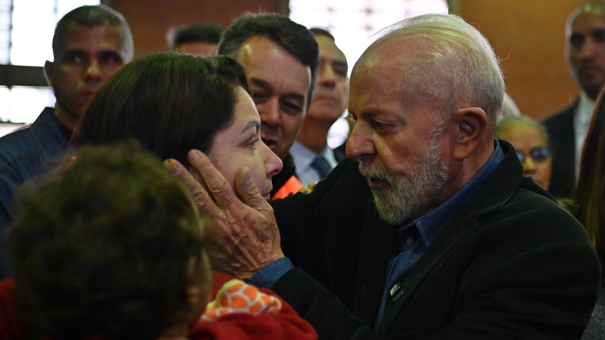 epaselect epa11342695 Brazilian President Luiz Inacio Lula Da Silva, with his wife Janja (R), meets people in a refugee site for those affected by the floodings in Sao Leopoldo, Rio Grande do Sul state, Brazil, 15 May 2024. The Government of the state of Rio Grande do Sul warned on 14 May that the Guaíba River could break the historical record reached last week, due to the heavy rains that fell in recent days. The worst floods in memory in the region have already caused more than 600,000 displaced people, 149 dead and 127 missing.  EPA/Andre Borges