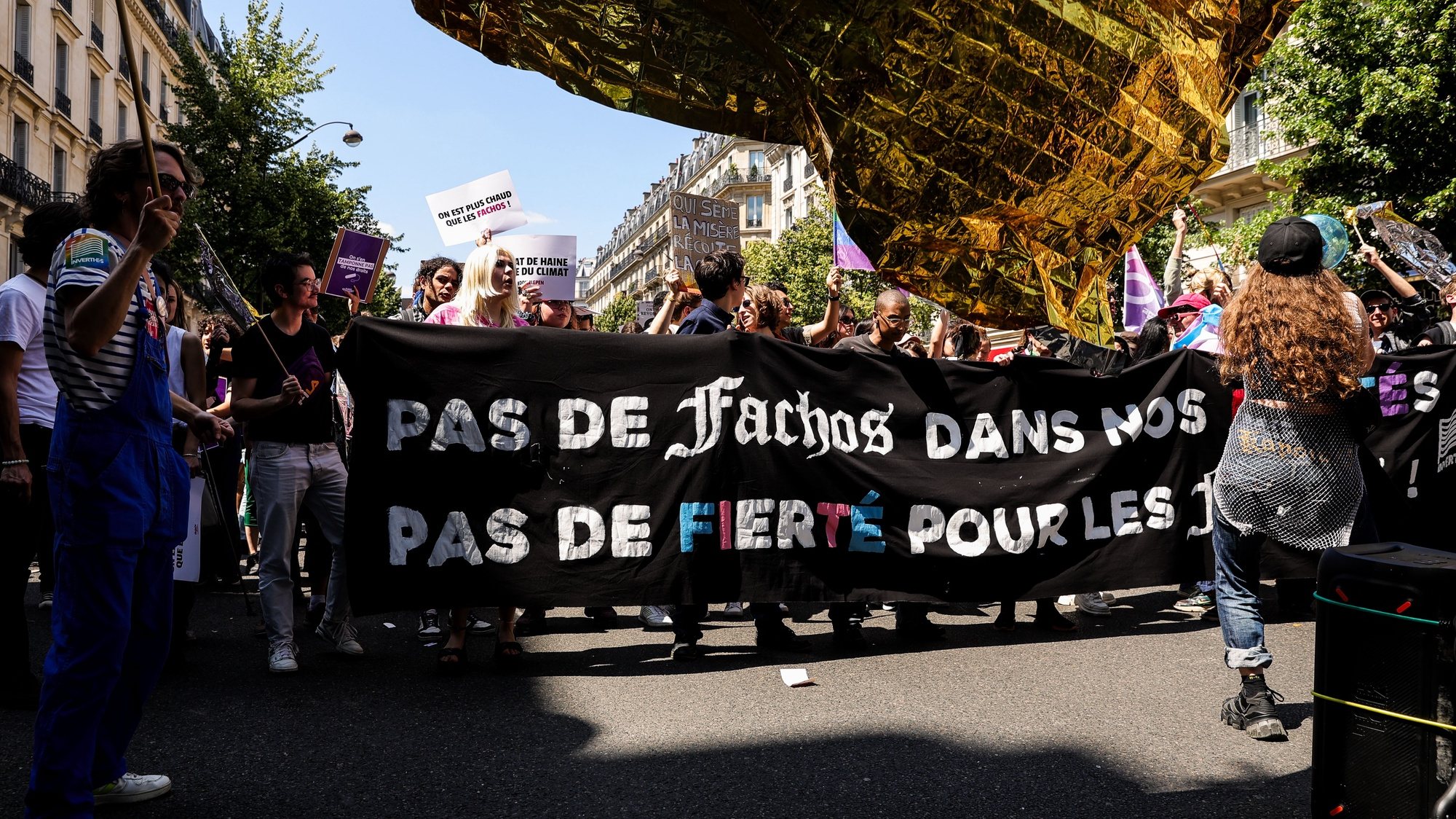 epa11432376 Demonstrators carry a banner with the message &#039;No fascists in our pride, no pride for the fascists&#039;, during a feminist demonstration against the extreme right in Paris, France, 23 June 2024. Over 200 associations, NGOs and trade unions denounce the extreme right&#039;s &#039;feminist facade&#039; and the &#039;real danger it represents&#039; for women&#039;s rights. With the upcoming french elections on 30 June and 07 July, civil society is mobilizing against the arrival of the French far right-wing party National Rally (Rassemblement National or RN).  EPA/Teresa Suarez