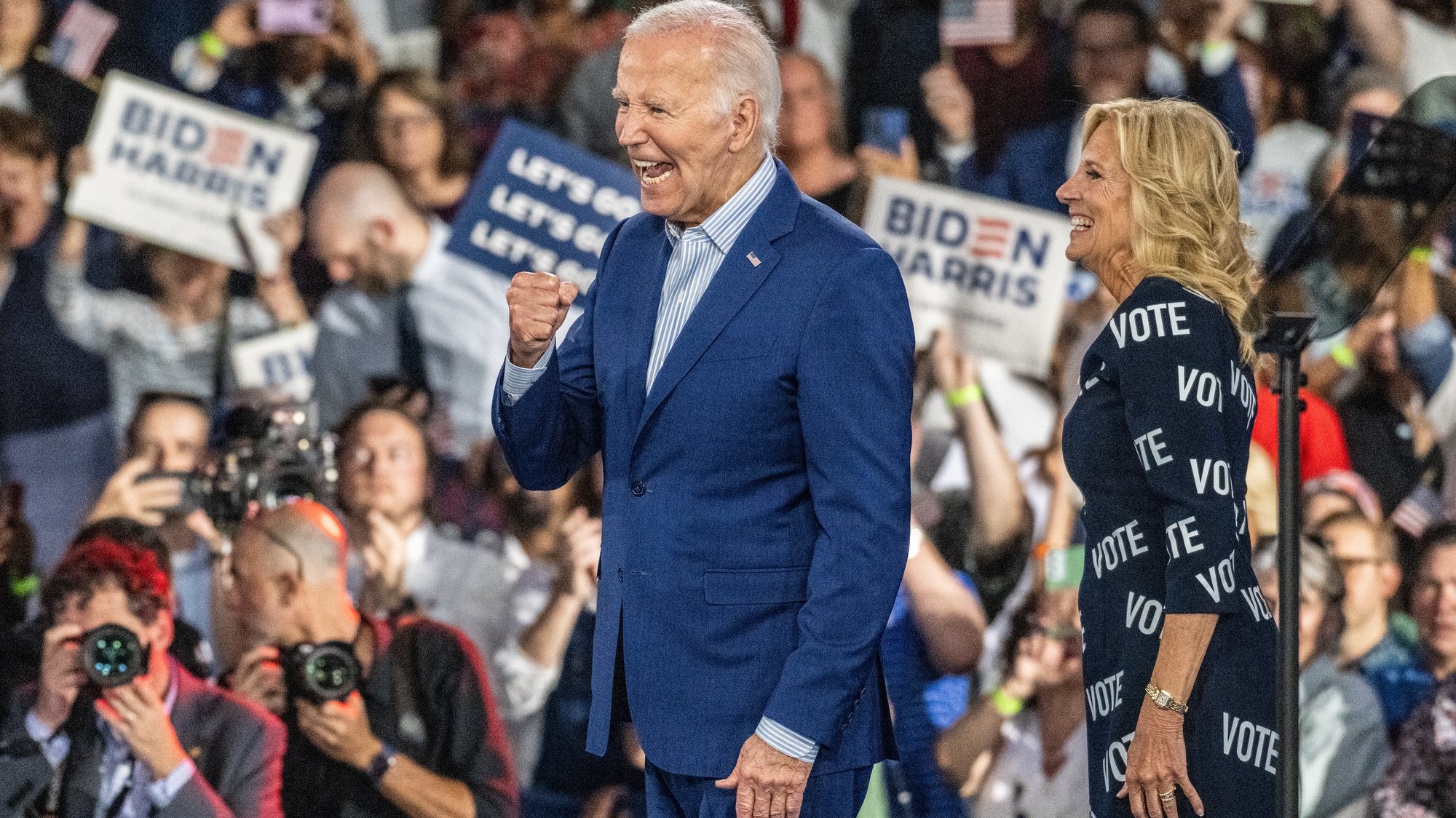 epaselect epa11443780 US President Joe Biden and First Lady Dr. Jill Biden react to the crowd during a campaign event at the Jim Graham Building at the North Carolina State Fairgrounds in Raleigh, North Carolina, USA, 28 June 2024.  EPA/STAN GILLILAND