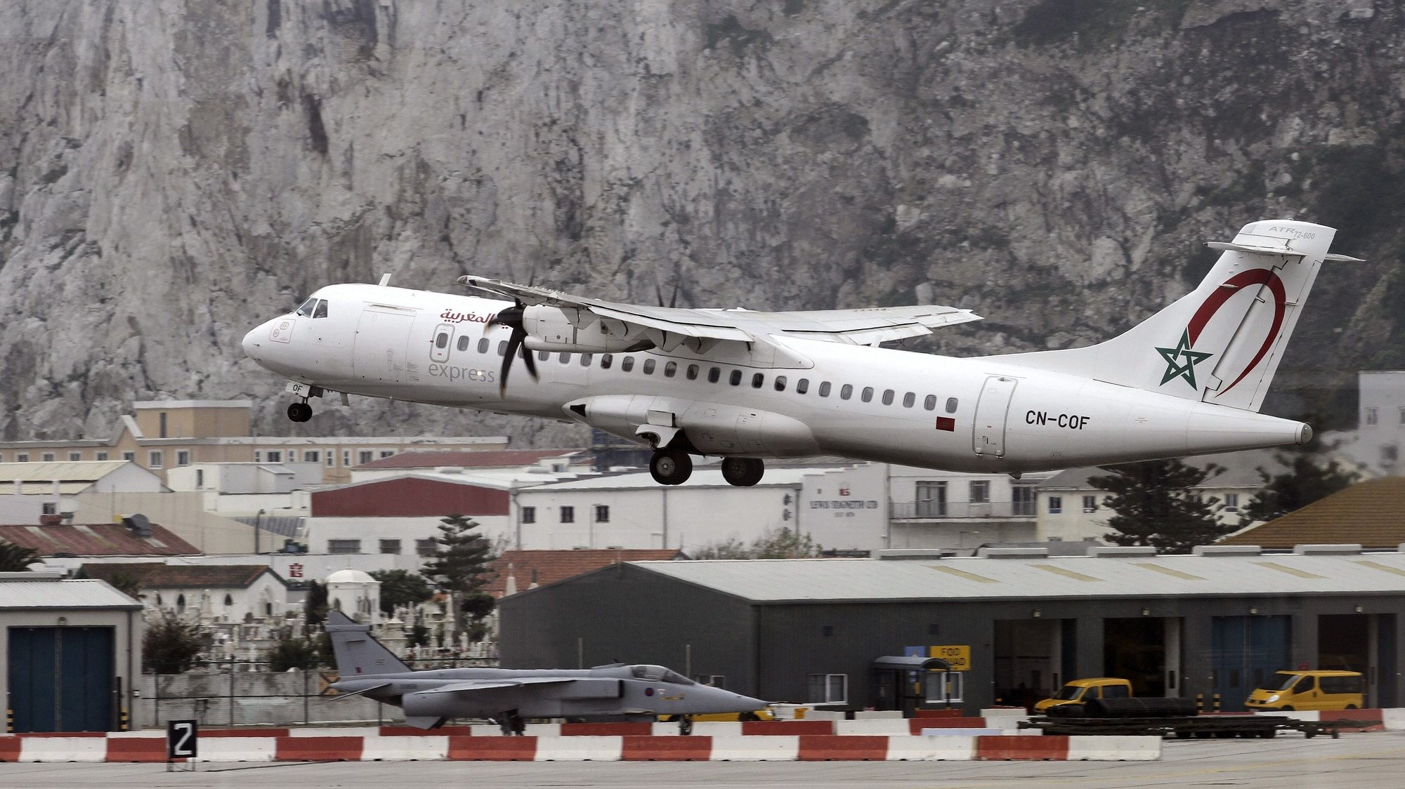 epa04170323 An ATR-72 600 plane of the Royal Air Maroc takes off from Gibraltar International Airport in Gibraltar, 17 April 2014. The Gibraltar-based &#039;Your Flight&#039; company on 17 April launched its new regular service between Marrakech in Marocco and Gibraltar every Sunday and on two Thursdays a month.  EPA/A.CARRASCO RAGE
