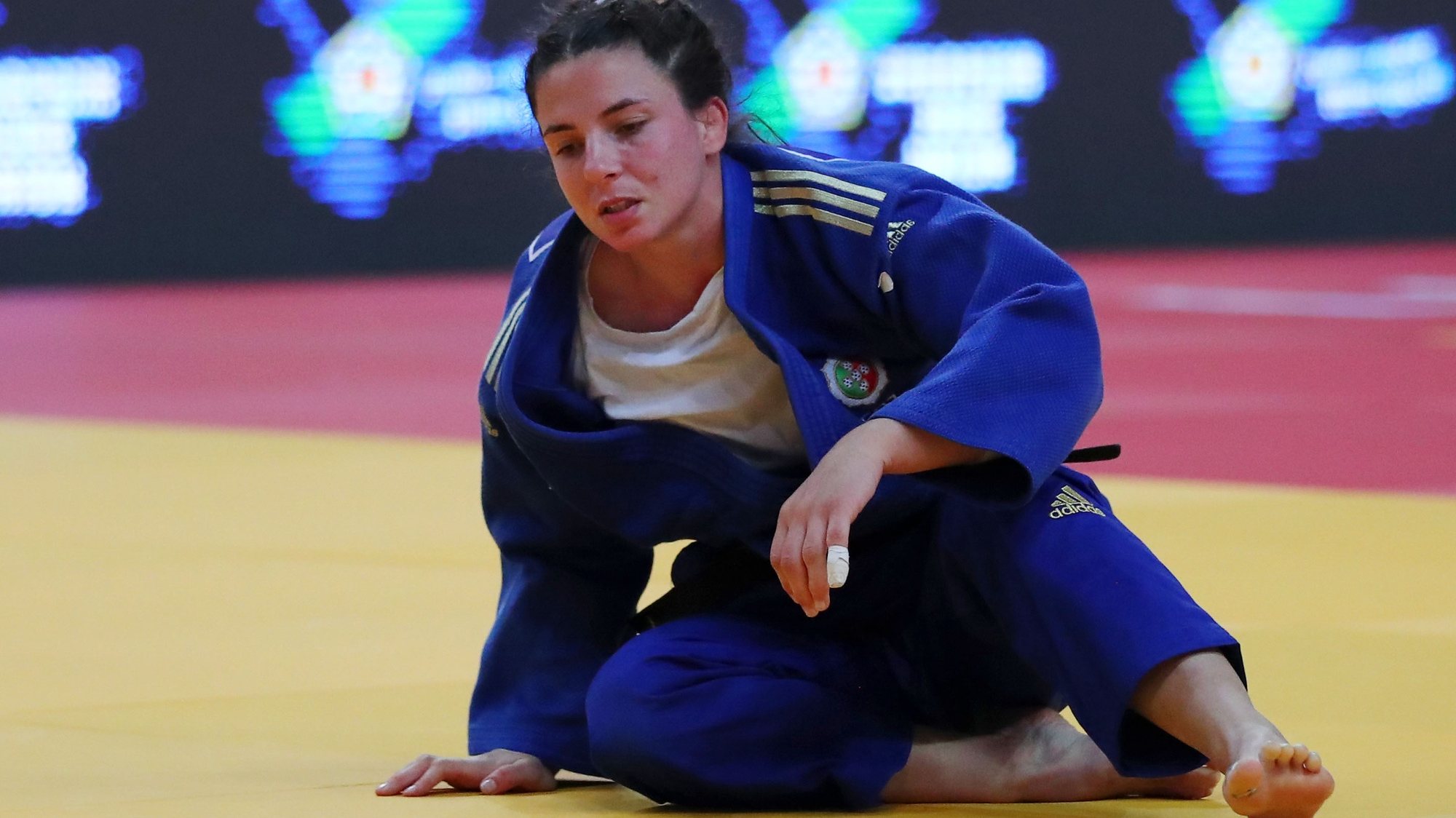 Bárbara Timo of Portugal (blue) reacts after her elimiation during the third round match in the woman&#039;s -70kg category at the European Judo Championships in Lisbon, Portugal, 17 April 2021. NUNO VEIGA/LUSA