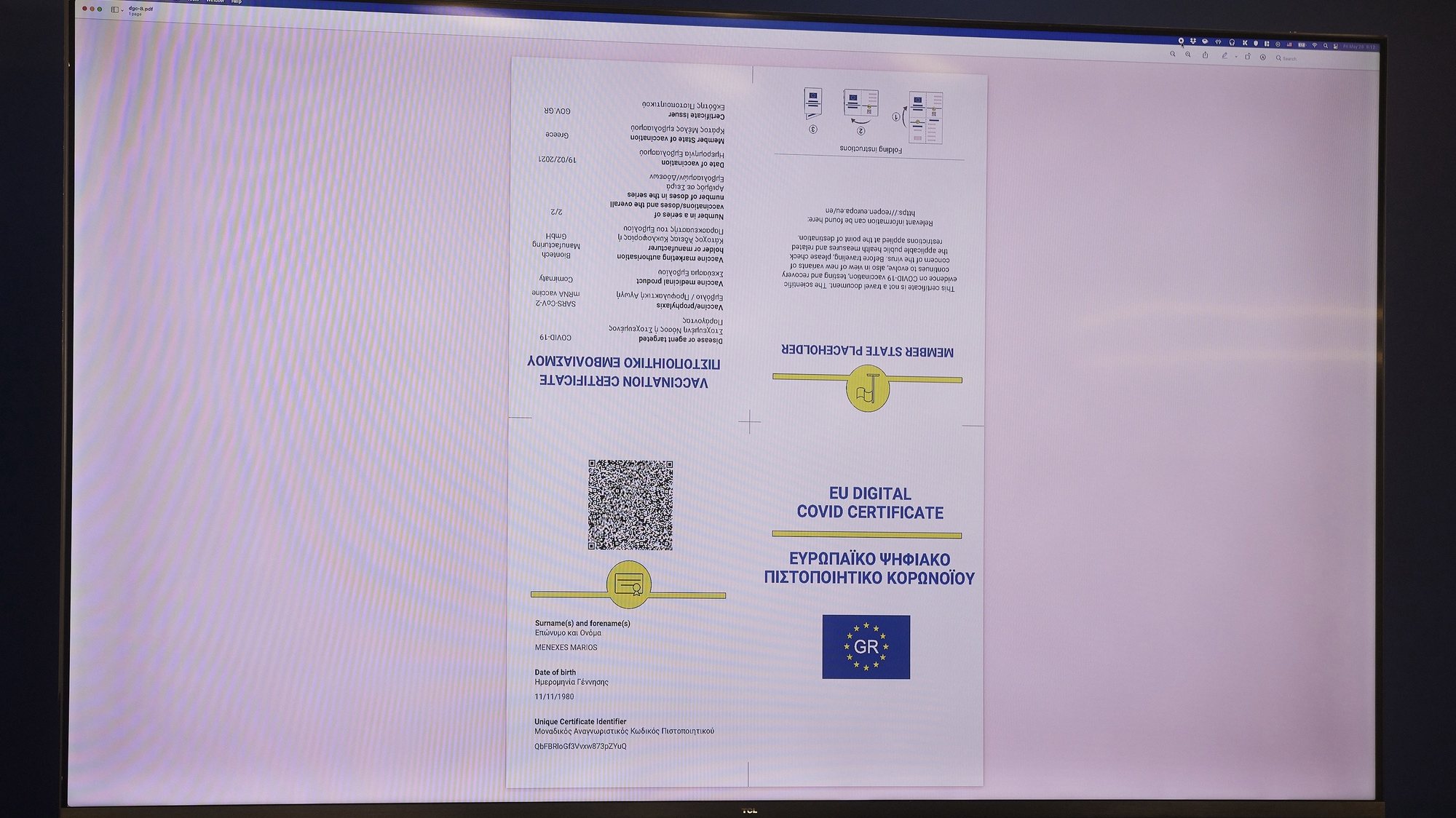 epa09232677 A handout photo made available by the Press Office of the Greek Prime Minister shows a screen displaying the EU Digital COVID Certificate, which will facilitate travelling within the European Union, during its presentation in Athens, Greece, 28 May 2021. &#039;Greece is ready to activate the digital certificate earlier than 01 July and we encourage other countries to do the same to avoid the complexity of bilateral negotiations&#039;, Greek Prime Minister Kyriakos Mitsotakis said while addressing the presentation of the EU Digital Covid Certificate.  EPA/DIMITRIS PAPAMITSOS/GREEK PRIME MINISTER&#039;S PRESS OFFICE HANDOUT  HANDOUT EDITORIAL USE ONLY/NO SALES