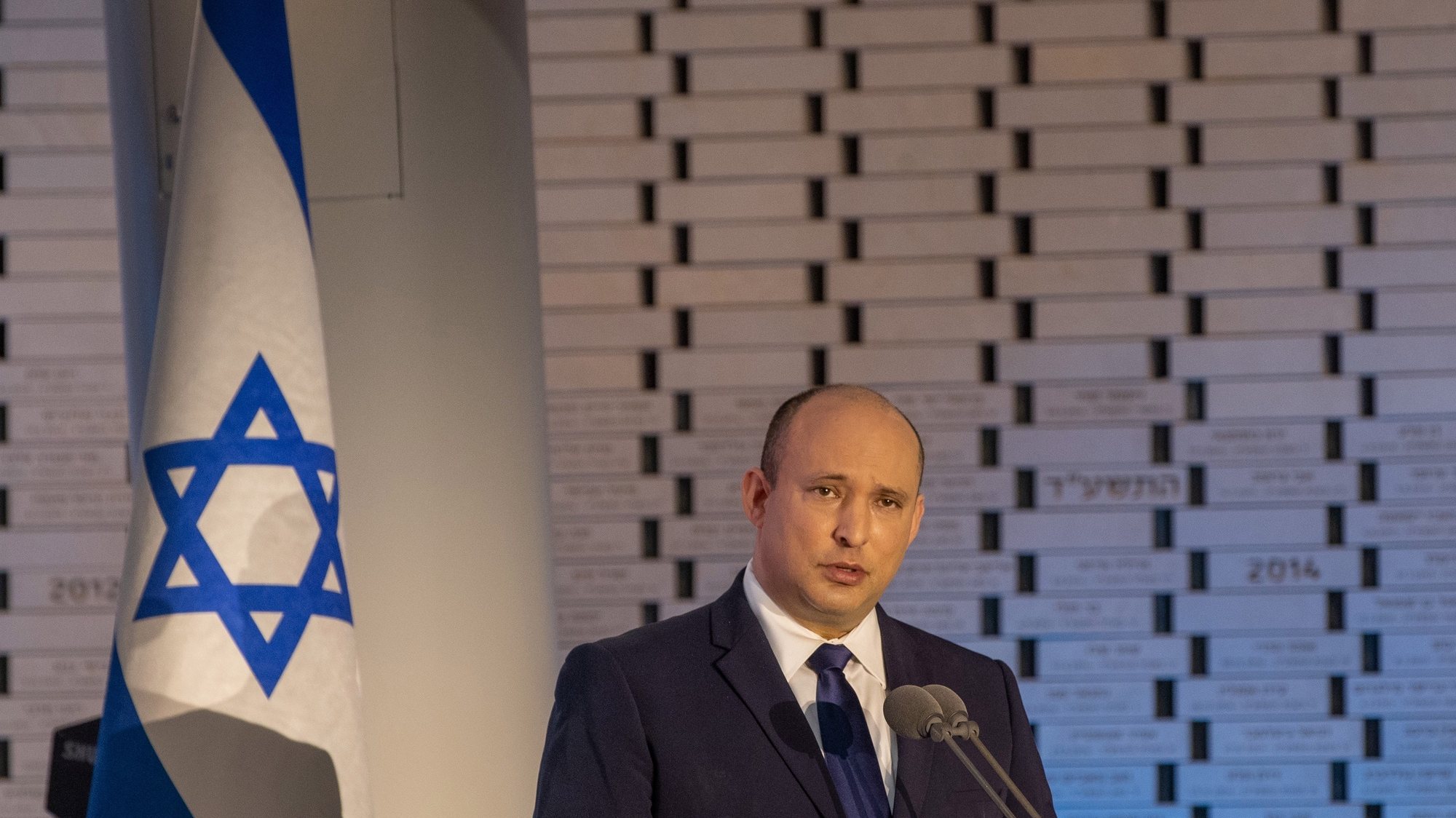 epa09476104 Israeli Prime Minister Naftali Bennett attends the 48th memorial ceremony for the fallen of the Yom Kippur War, also known as the Ramadan War or October War, at Mt. Herzl in Jerusalem, 19 September 2021.  EPA/Ohad Zwigenberg / POOL