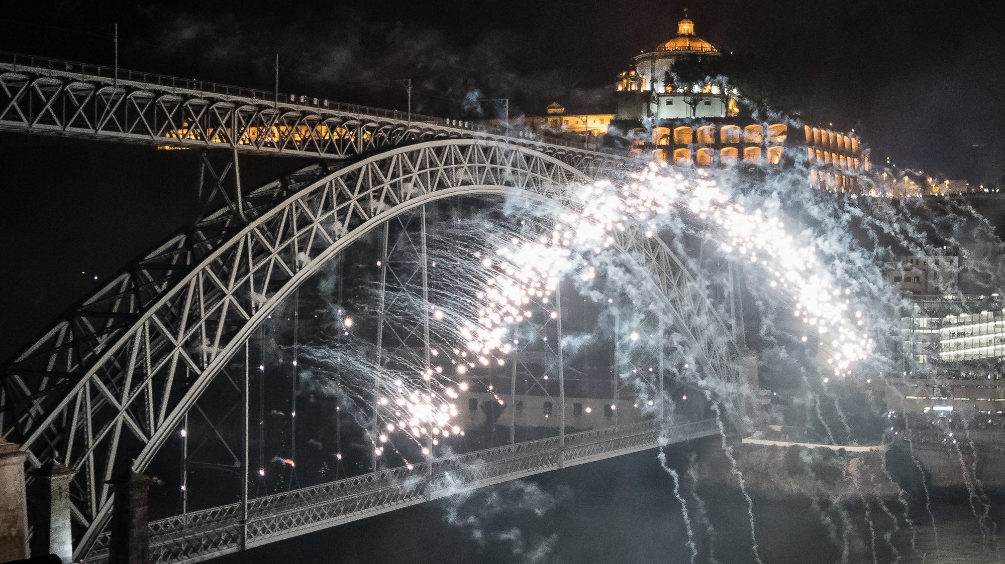 epa06046689 A view of fireworks over the Dom Luis I Bridge and the River Douro on the eve of St. John&#039;s festival (Festa de Sao Joao) in Porto, Portugal, 24 June 2017.  EPA/RUI FARINHA